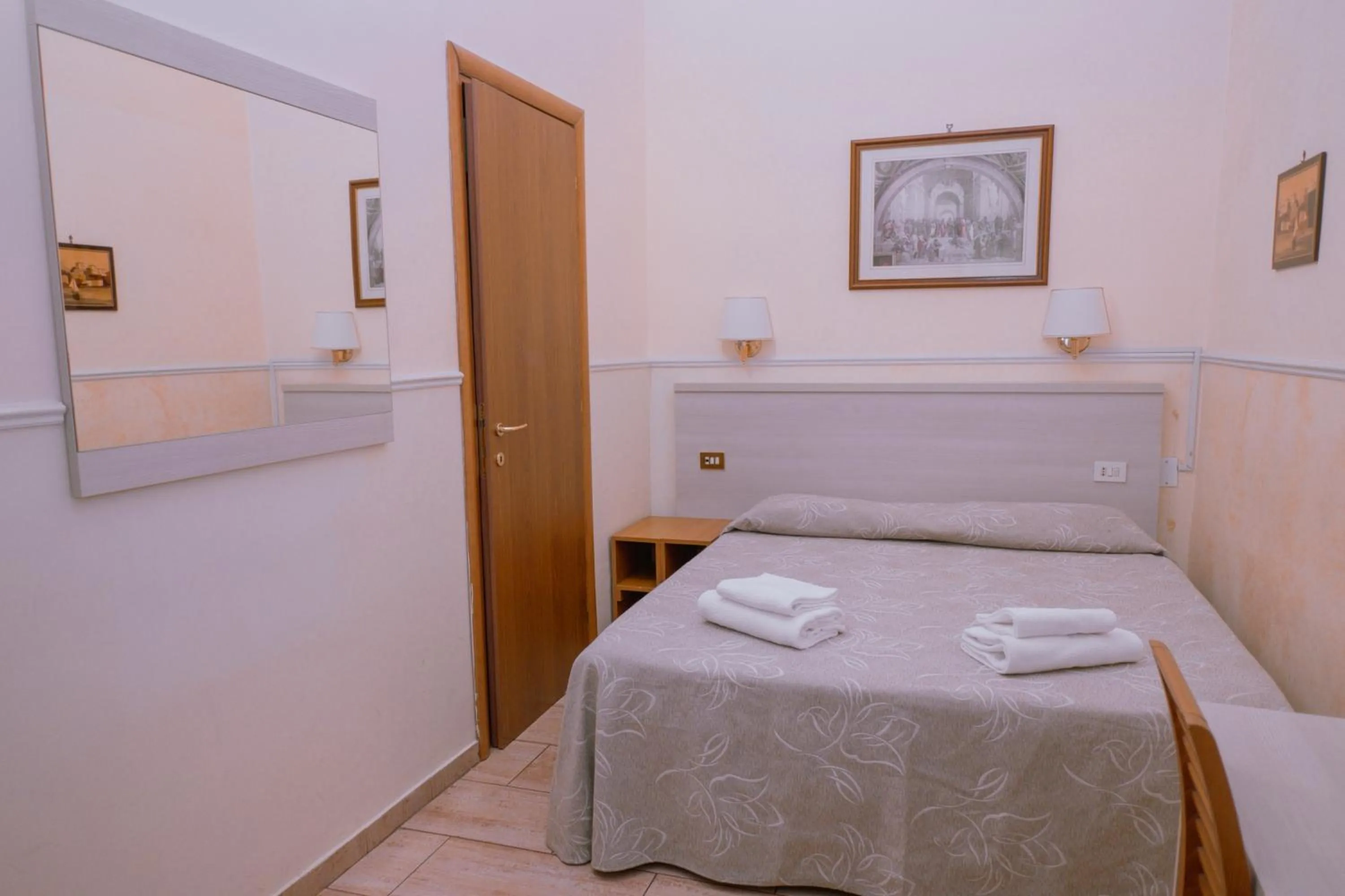 Bed in Hotel Aristotele