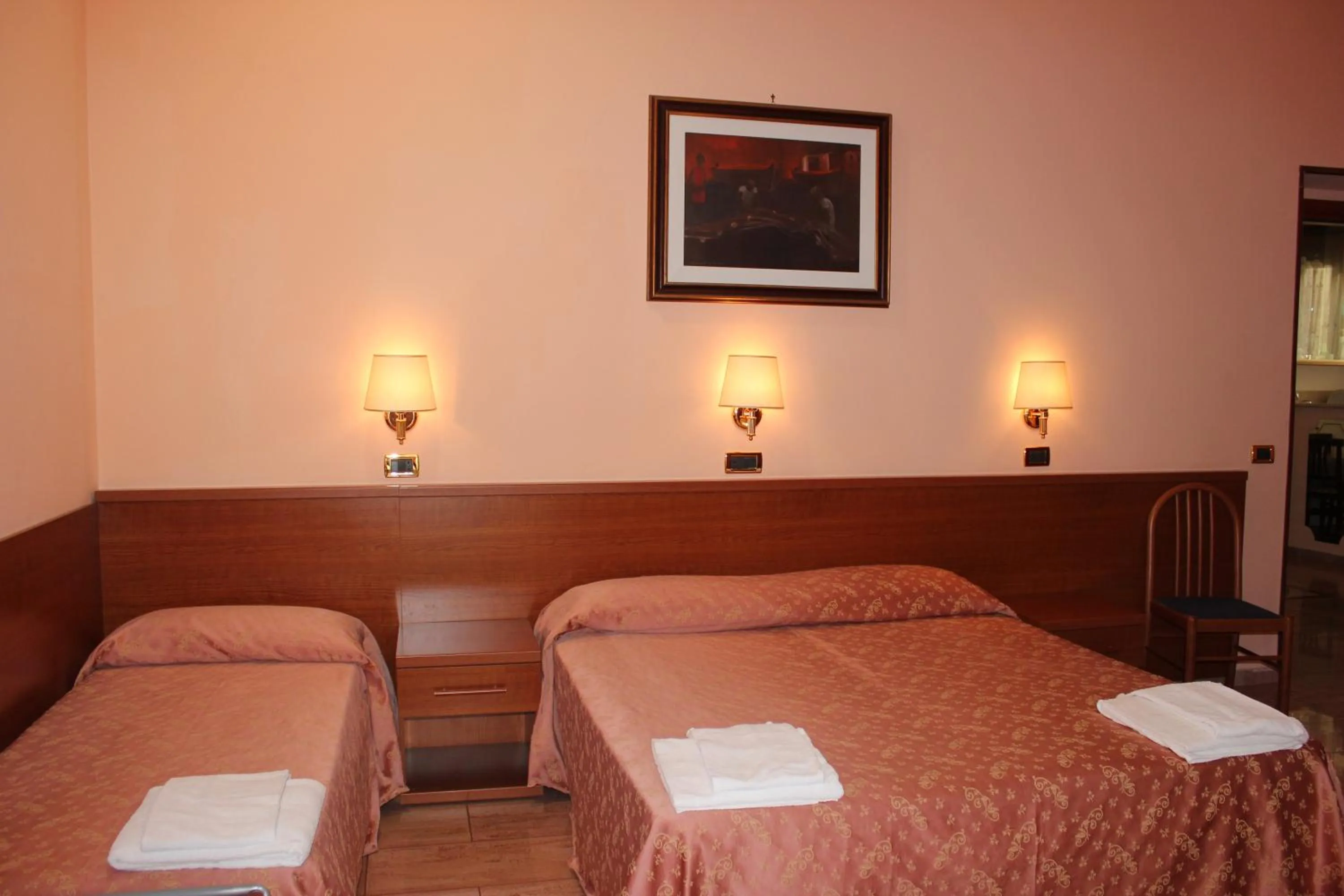 Bed in Hotel Aristotele