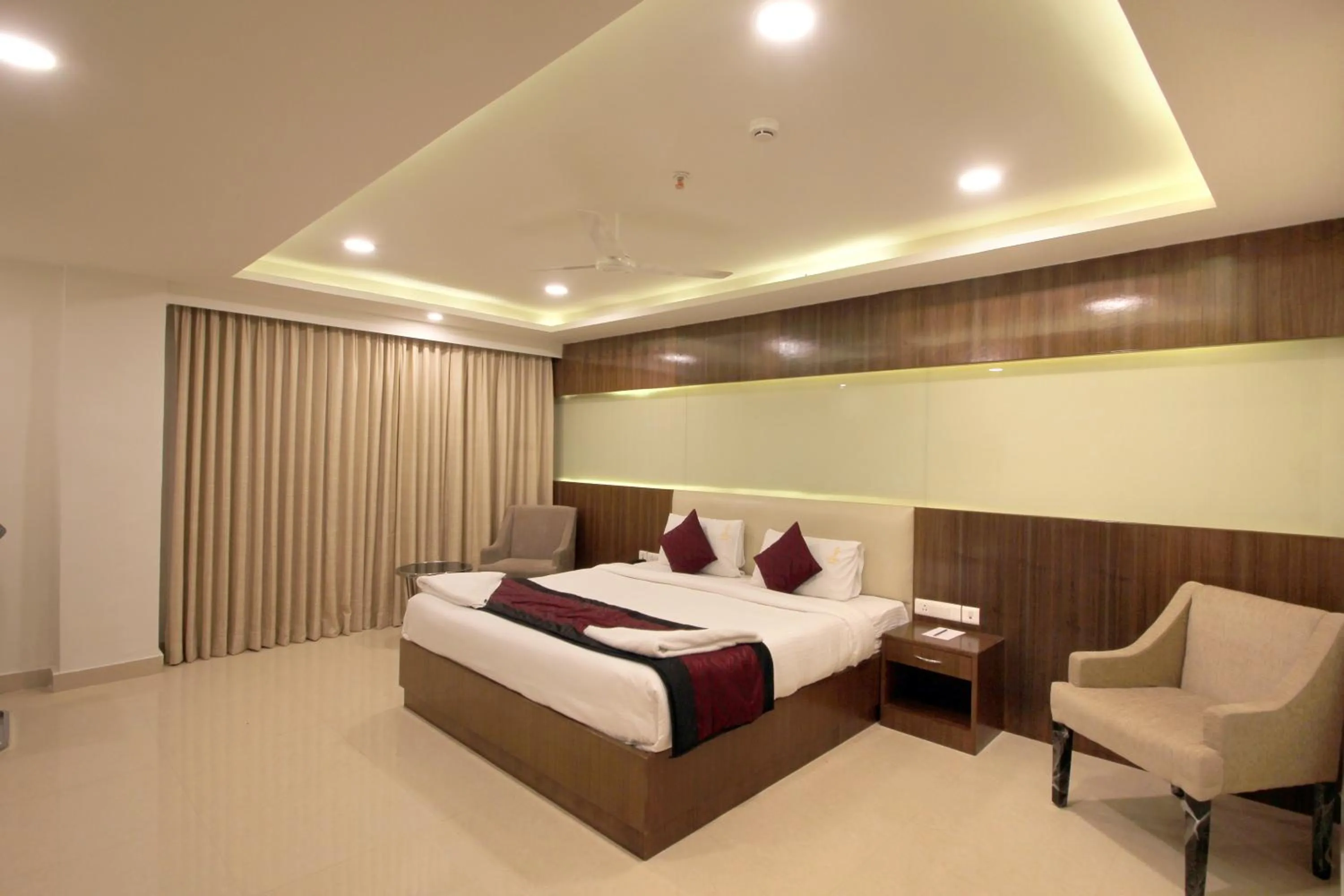 Bed in Hotel Hyderabad Grand