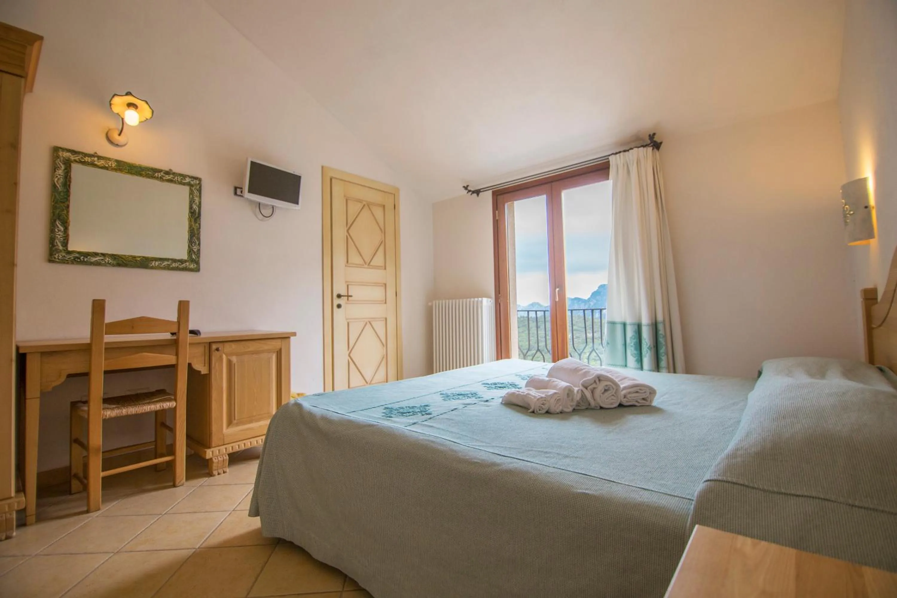 Spring, Bed in Gorropu Hotel