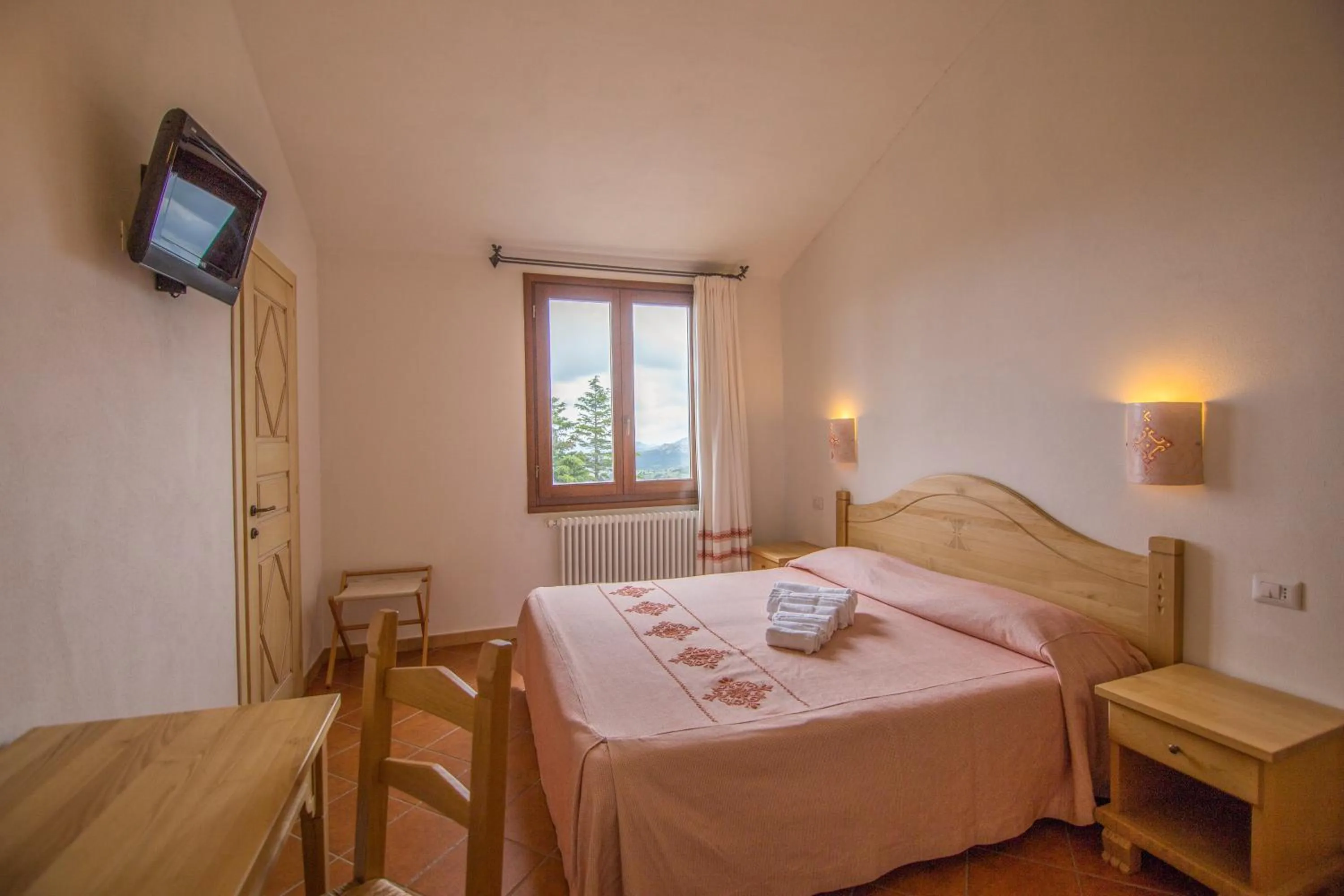 Spring, Bed in Gorropu Hotel