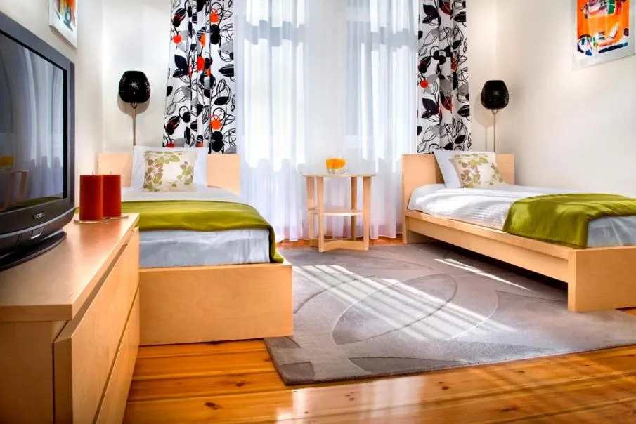 Bed in Apartamenty Pomarańczarnia