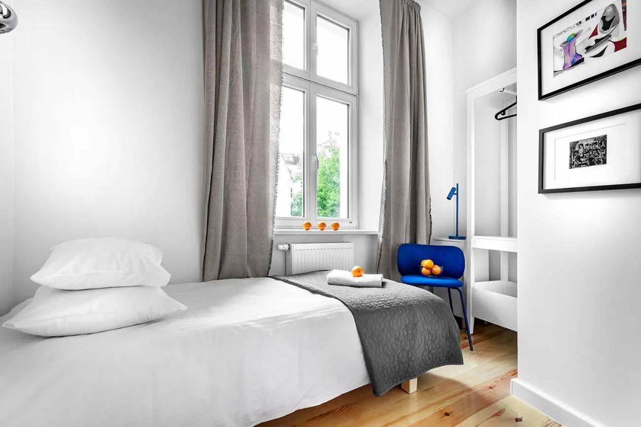 Bed in Apartamenty Pomarańczarnia