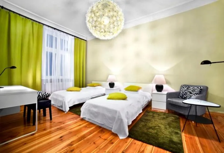 Bed in Apartamenty Pomarańczarnia