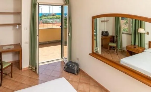 Bed in Hotel Baia Del Sole