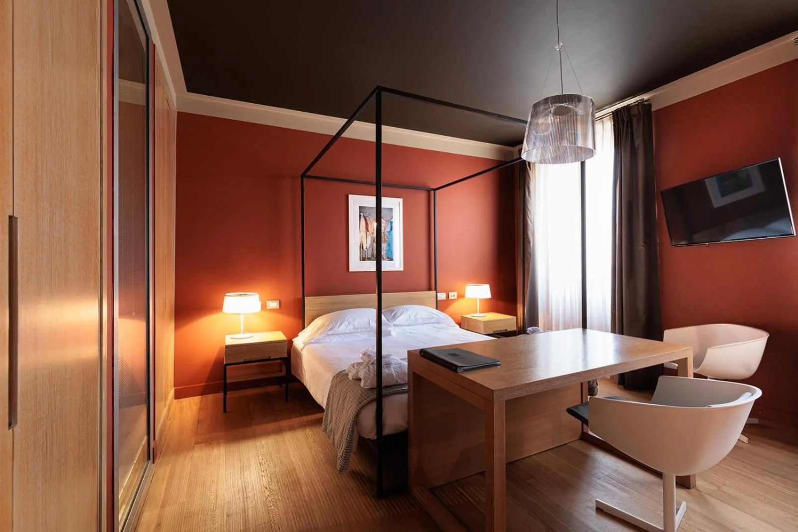 Bed in Escalus Luxury Suites Verona