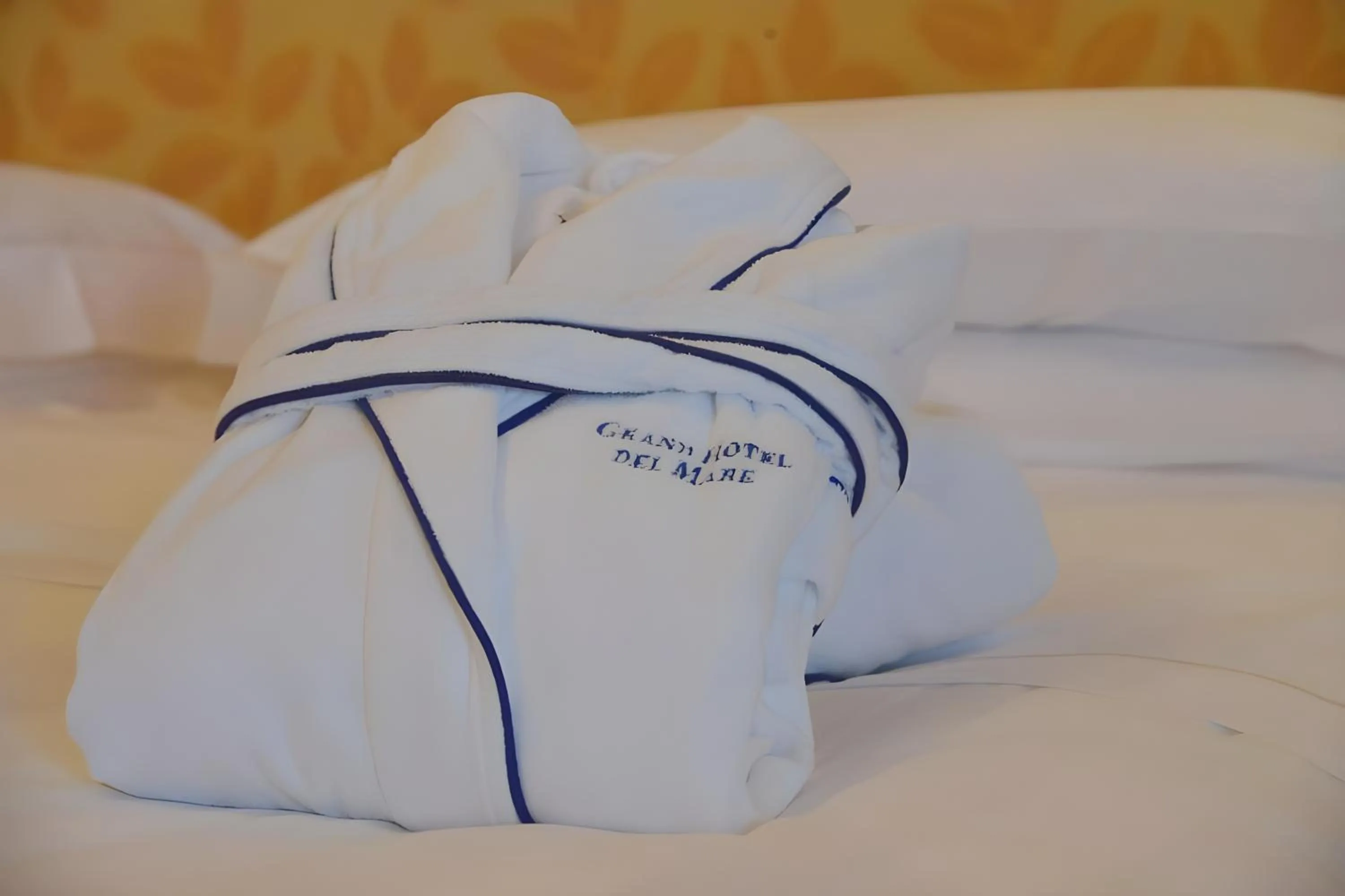 Bed in Grand Hotel Del Mare Resort & Spa