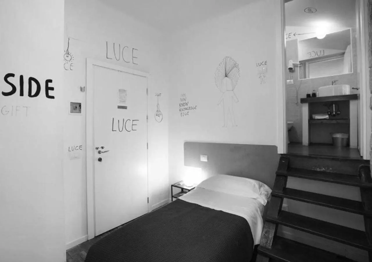 Bed in Boutique Hotel Novecento