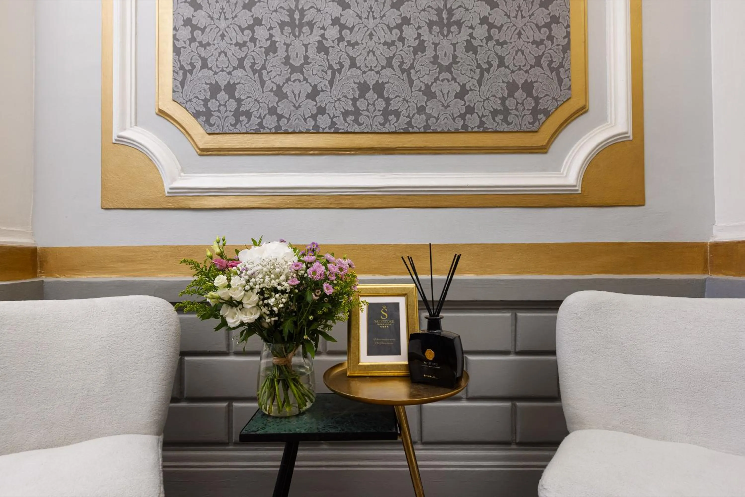 Seating area in Salvatore Prague Rooms