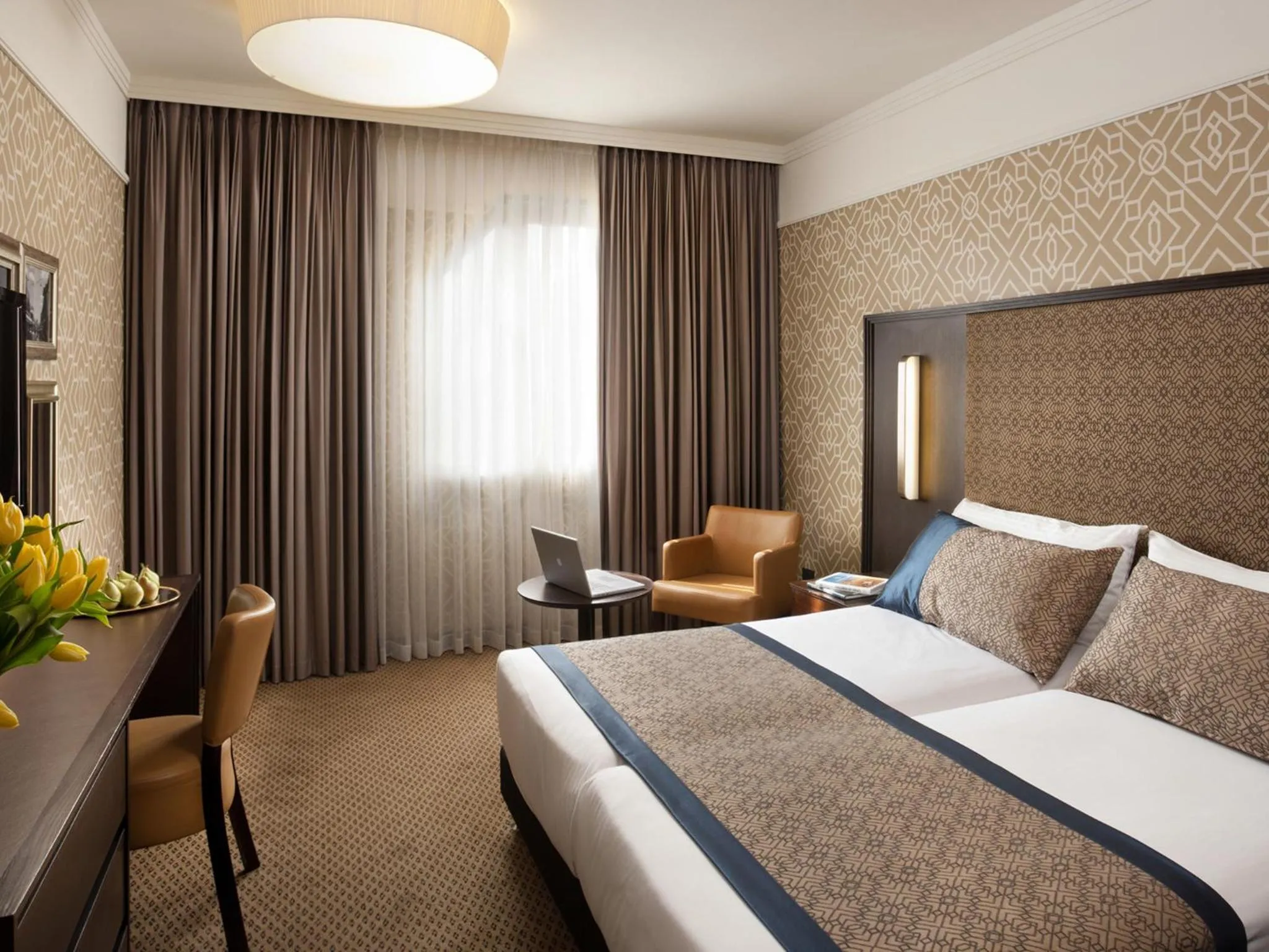 Bed in Dan Panorama Jerusalem Hotel