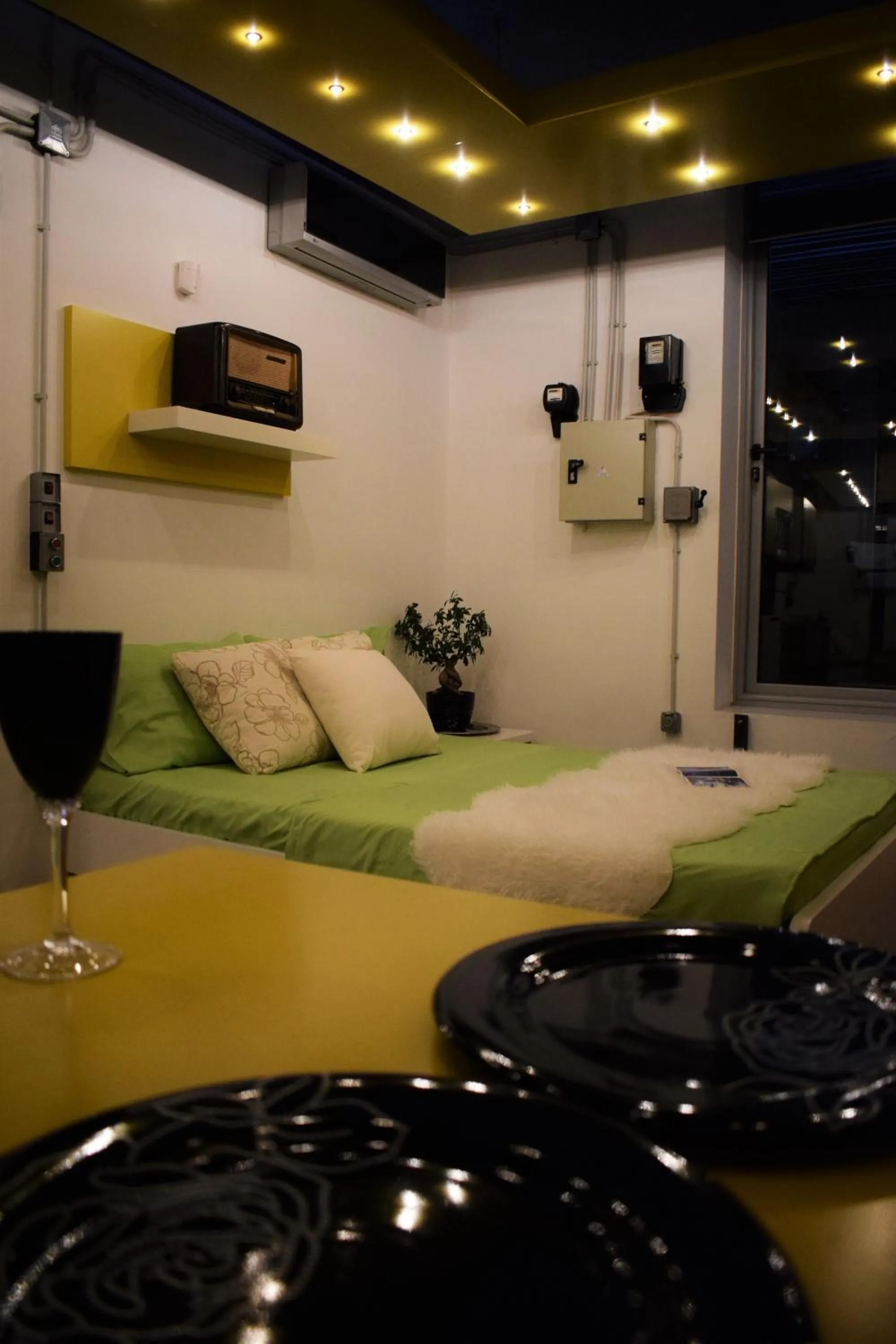 Bed in Panorama Penthouse & Studios