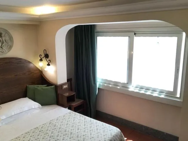 Bed in Hotel OKAPI