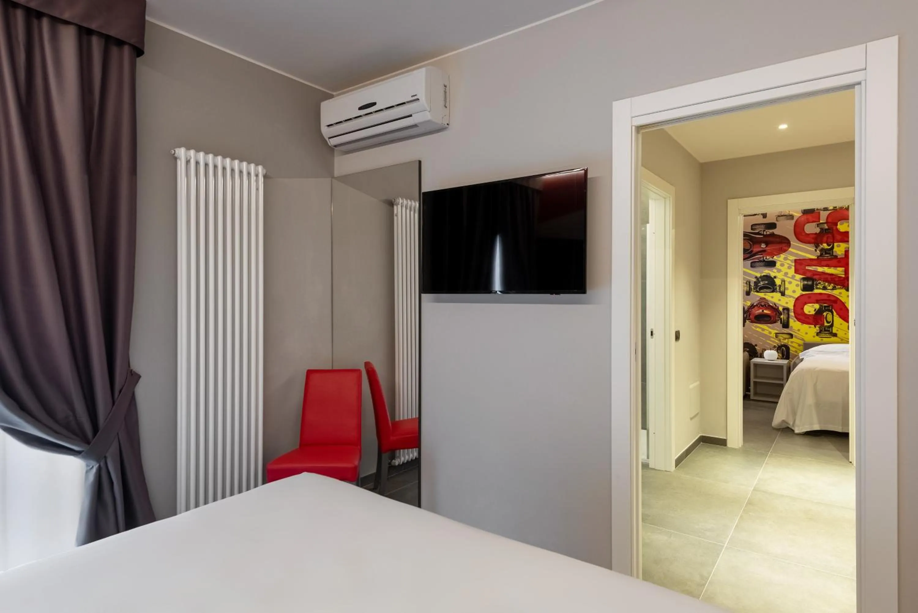 TV and multimedia, Bed in Hotel Maranello Village