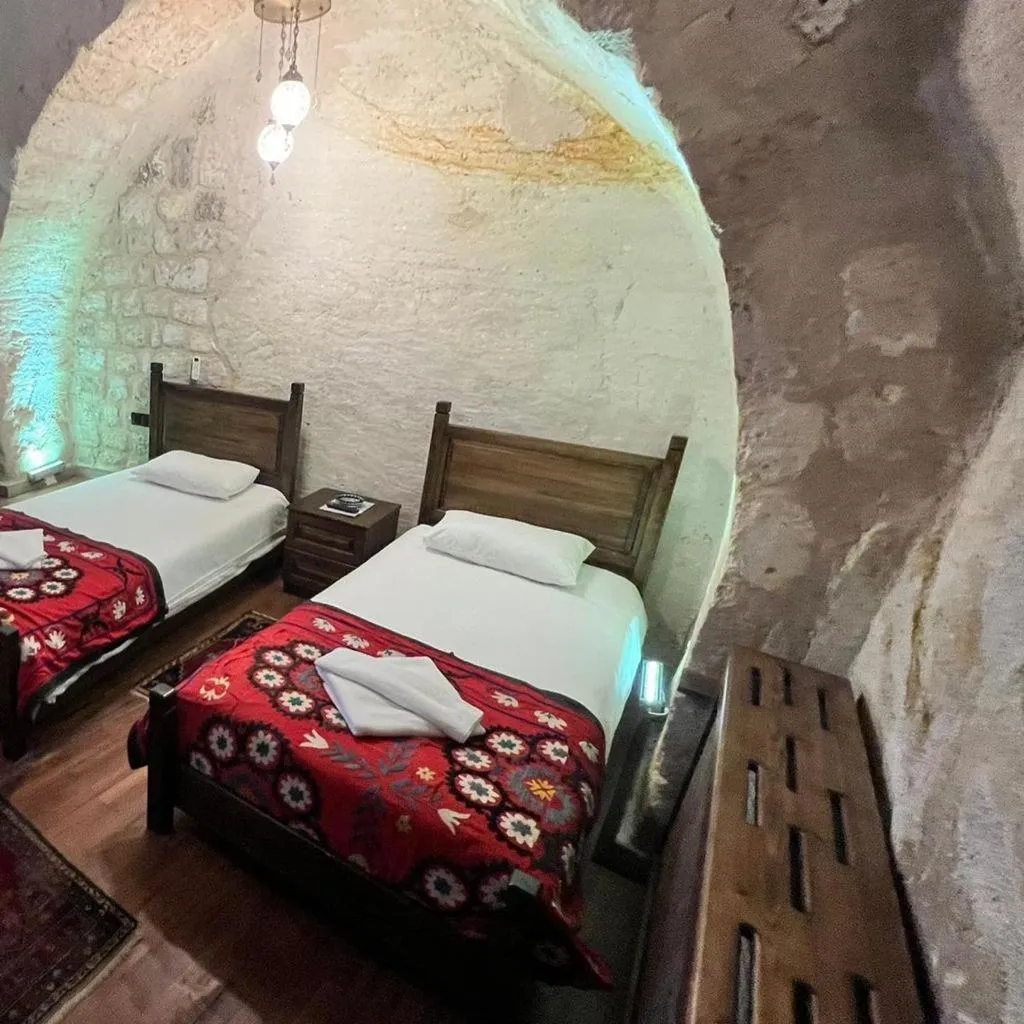 Bed in Ürgüp Inn Cave Hotel