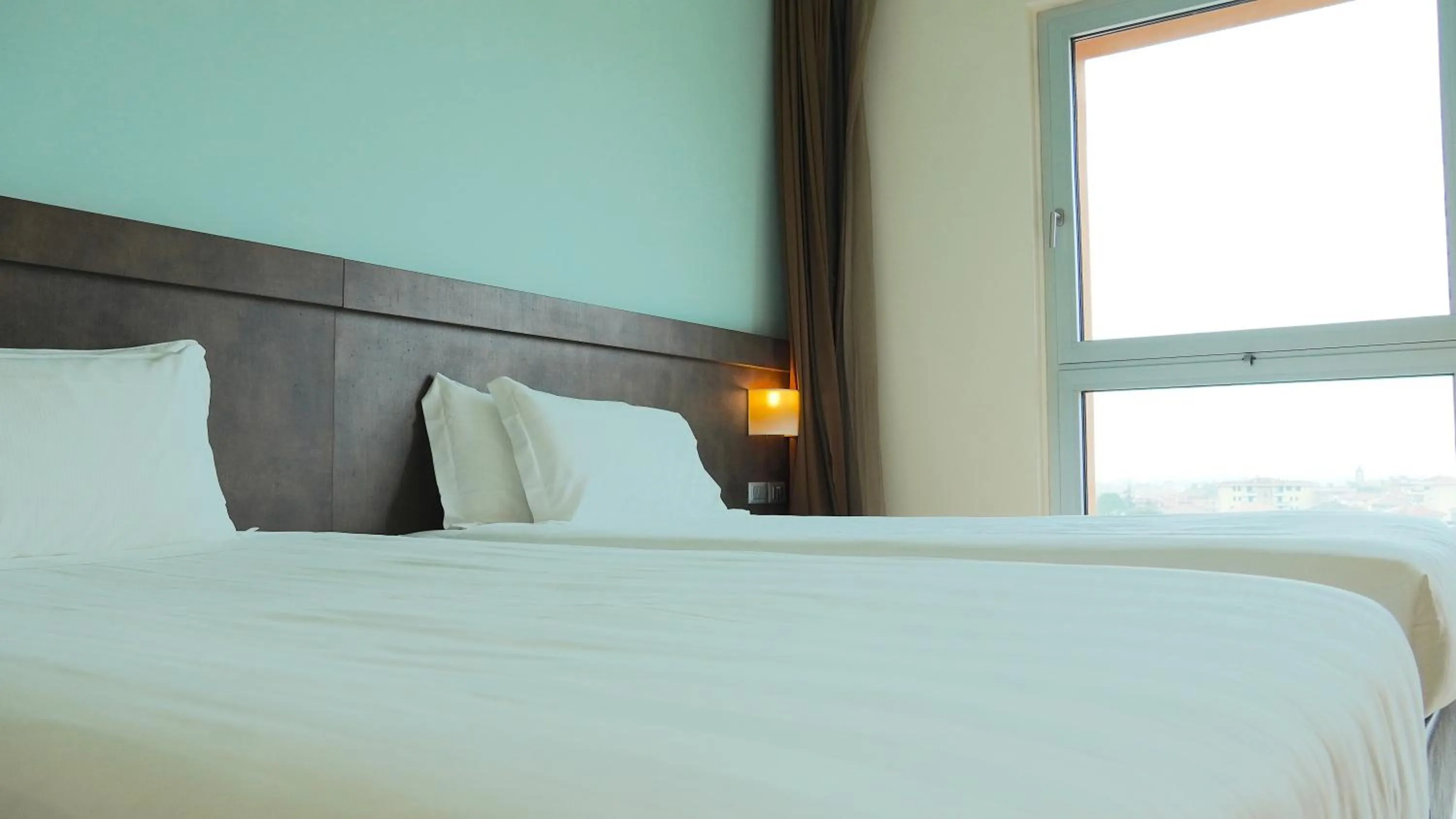 Bed in Blu Arena Hotel