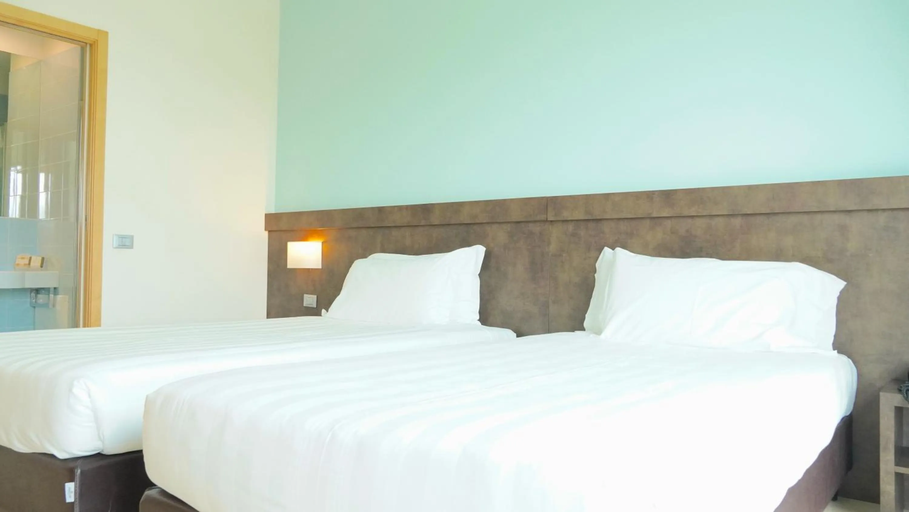 Bed in Blu Arena Hotel