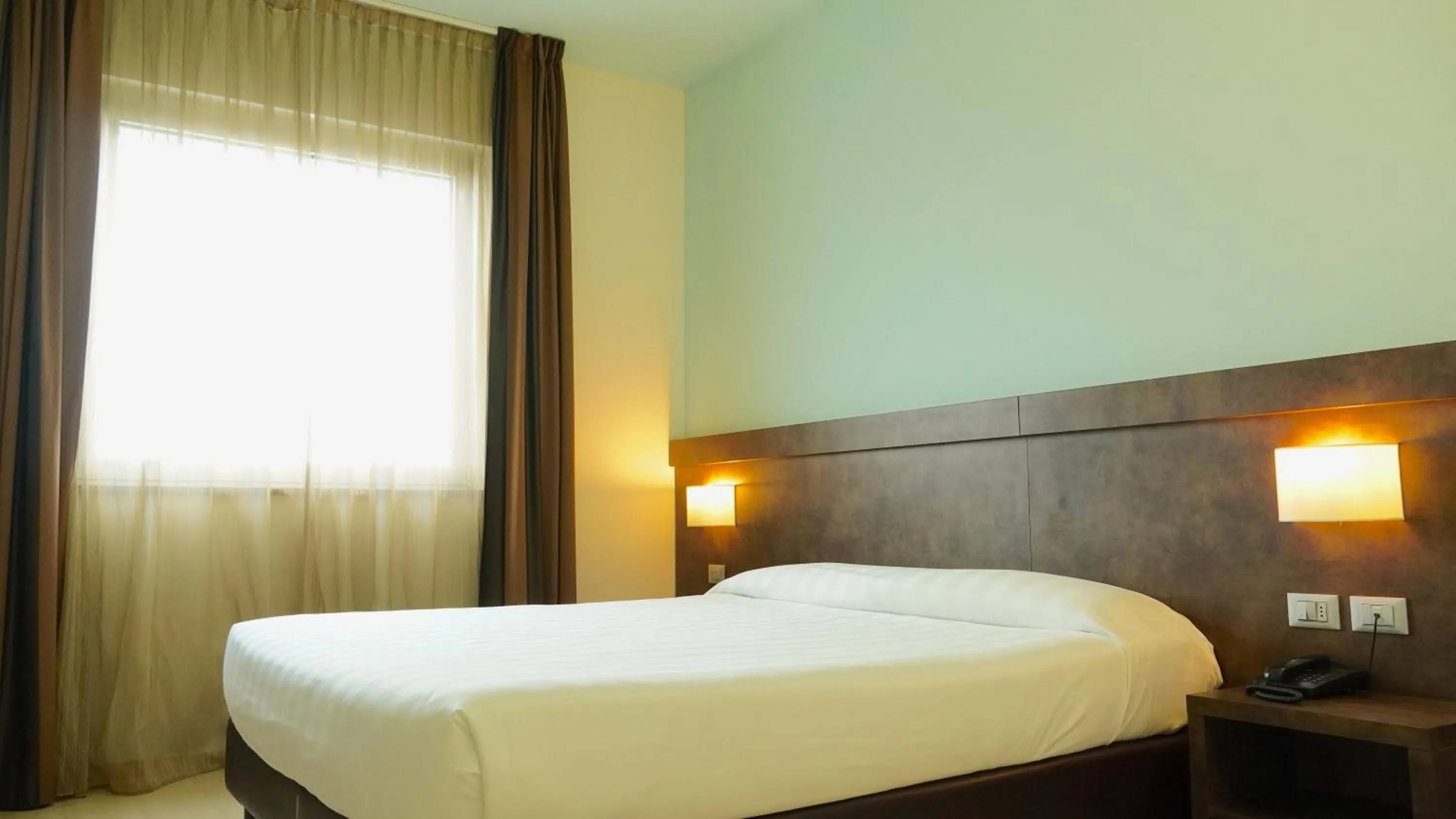 Bed in Blu Arena Hotel