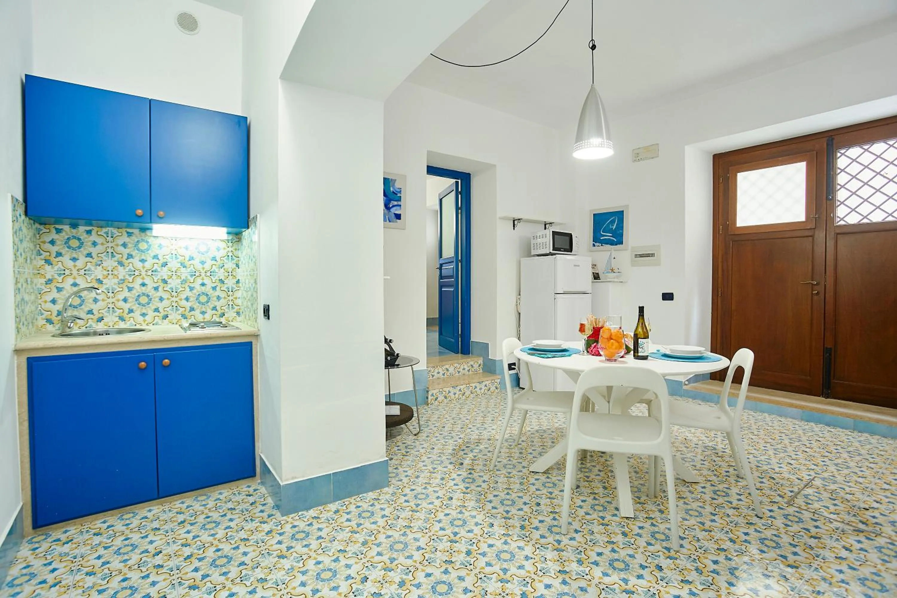 Kitchen or kitchenette in Appartamenti Rosa Dei Venti