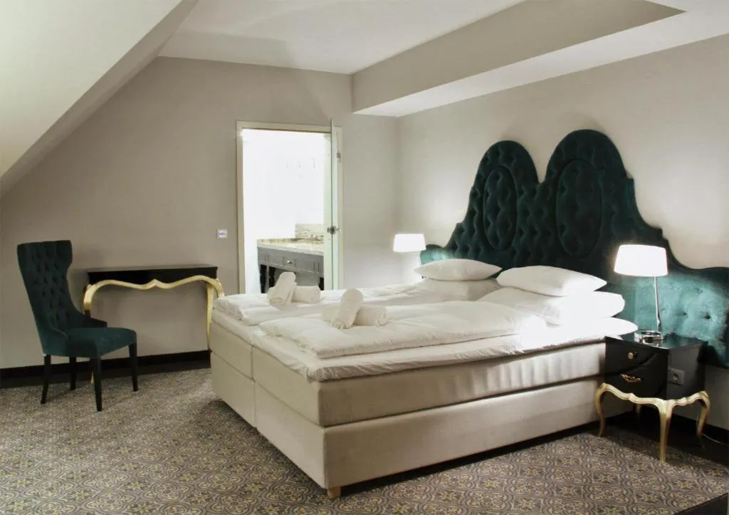 Bed in Pałac na Wodzie Hotel & SPA