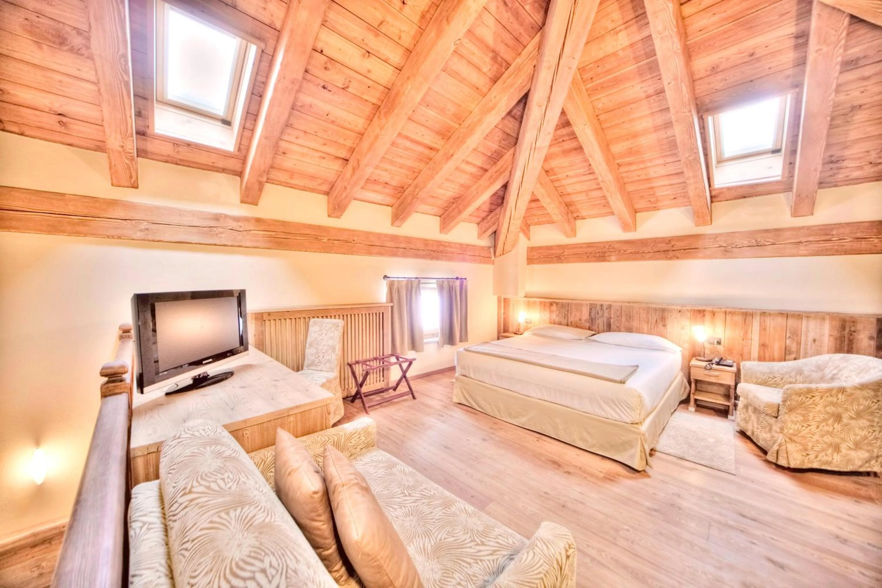 Bed in Le Miramonti Hotel Restaurant & Wellness