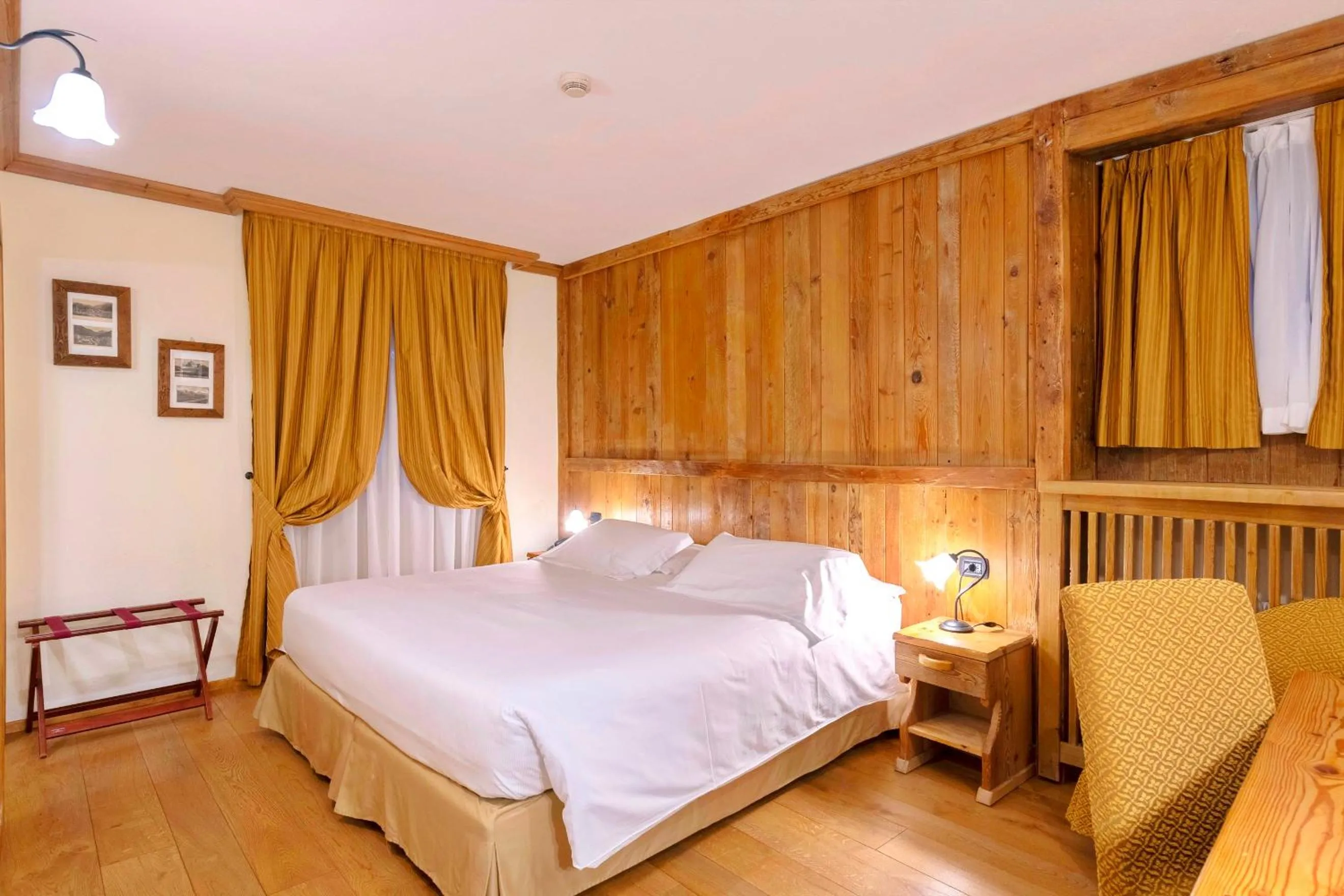 Bed in Le Miramonti Hotel Restaurant & Wellness