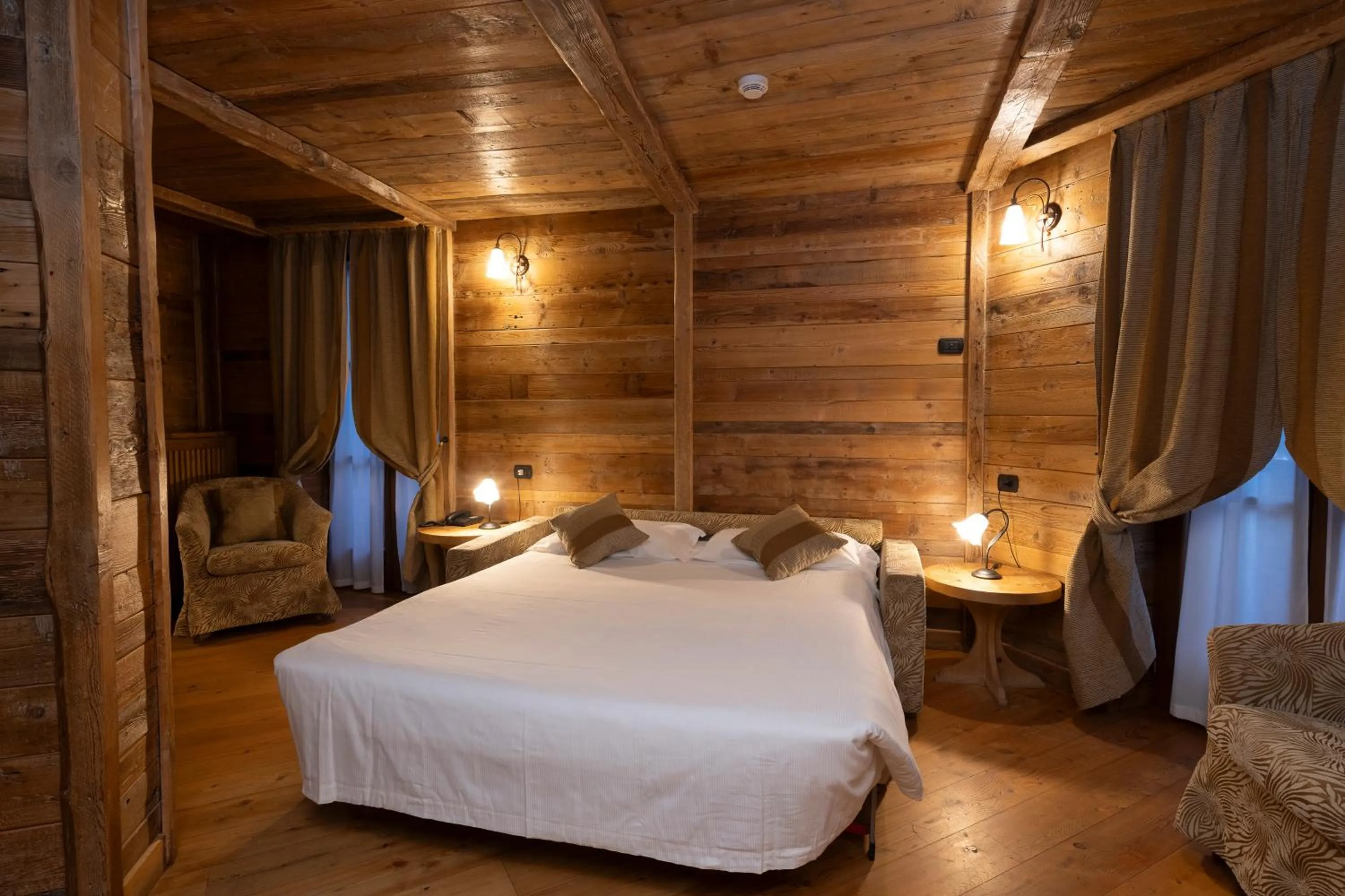 Bed in Le Miramonti Hotel Restaurant & Wellness