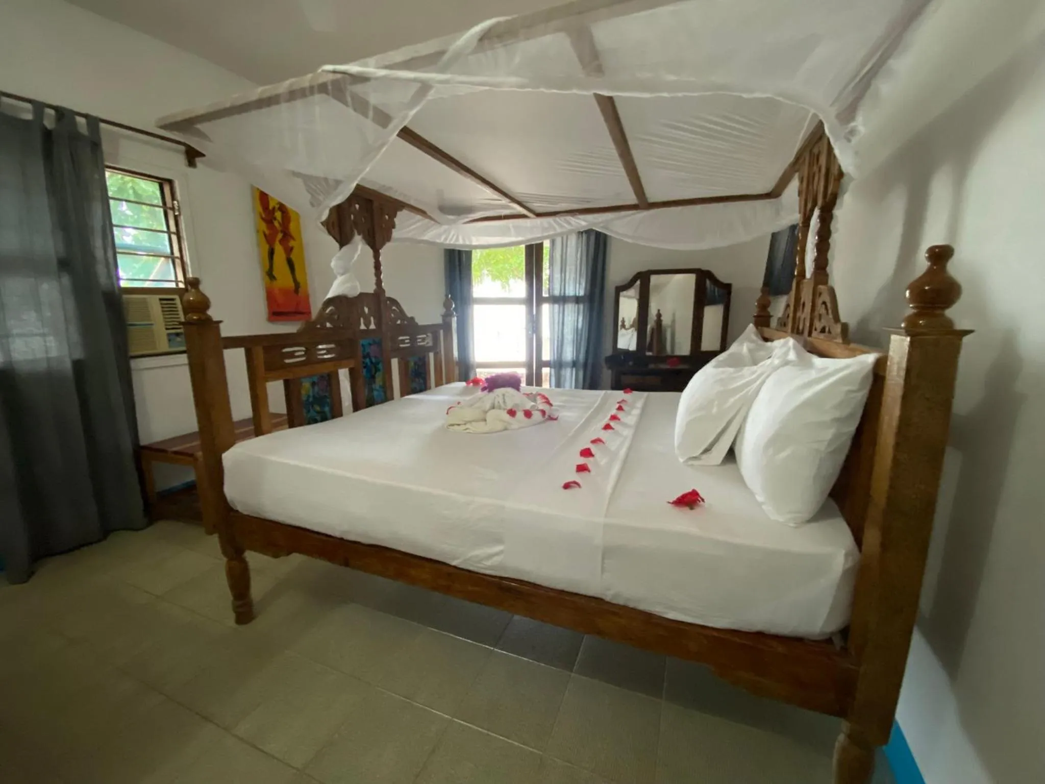 Bed in Menai Bay Beach Bungalows