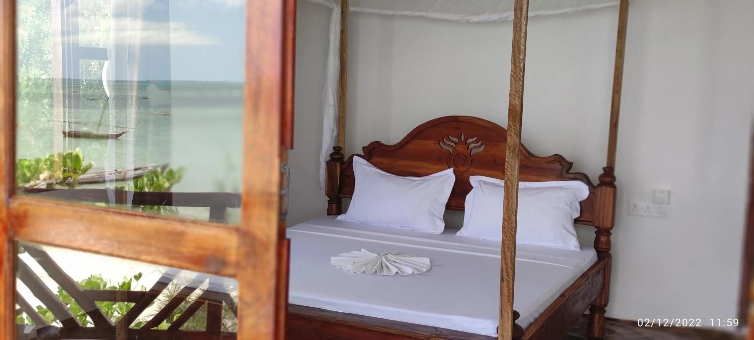 Bed in Menai Bay Beach Bungalows