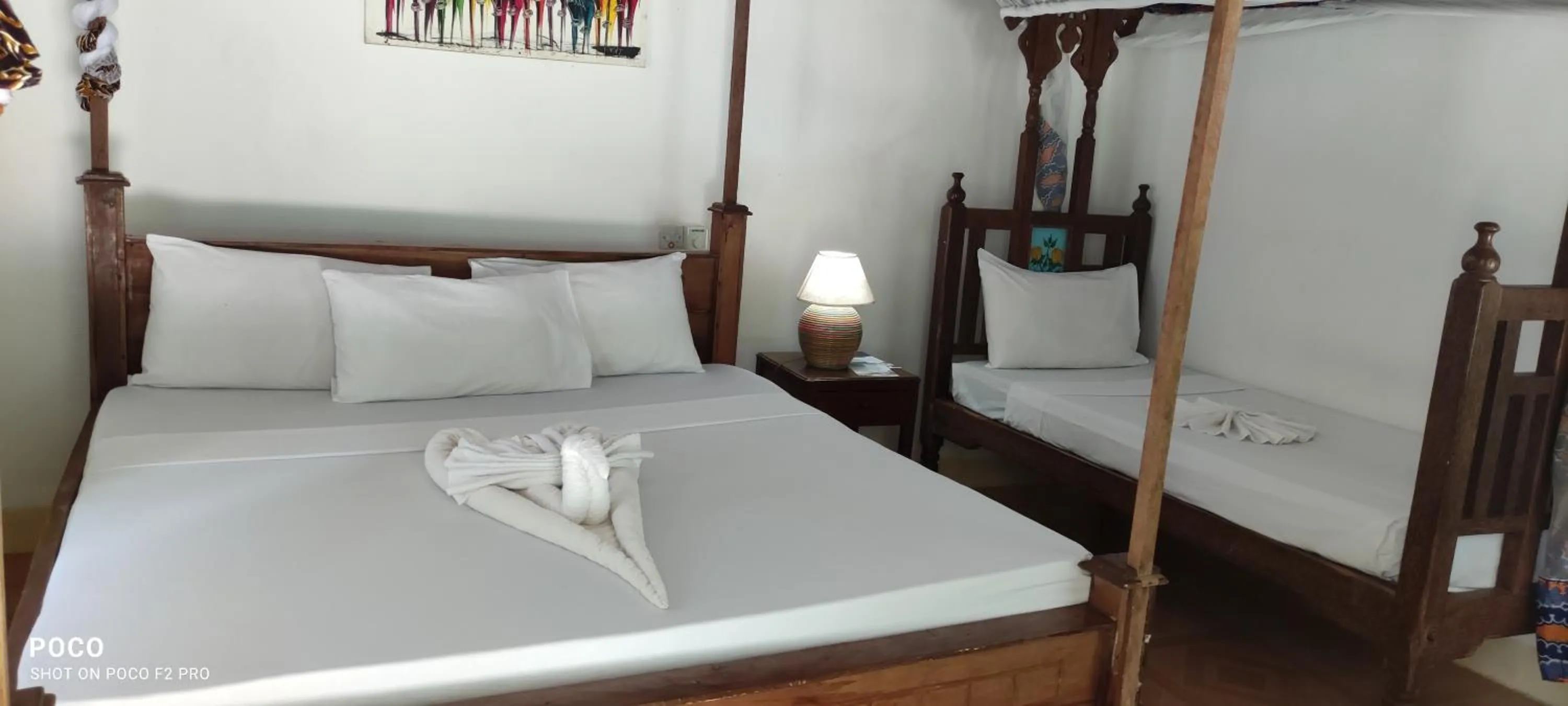 Bed in Menai Bay Beach Bungalows