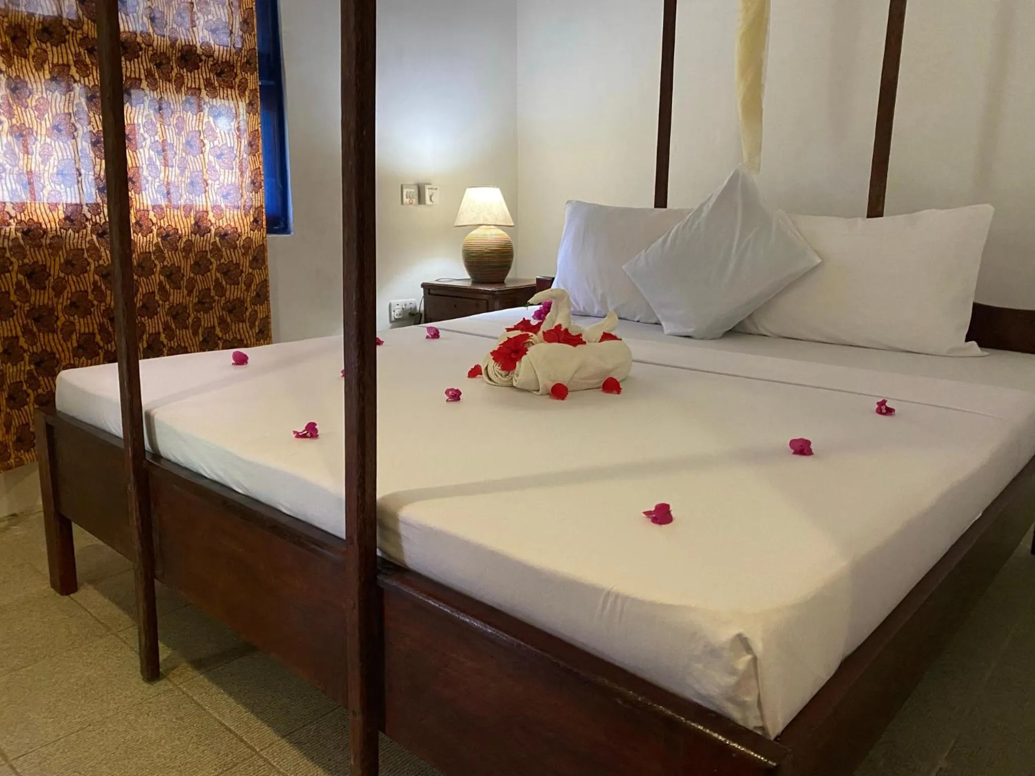 Bed in Menai Bay Beach Bungalows