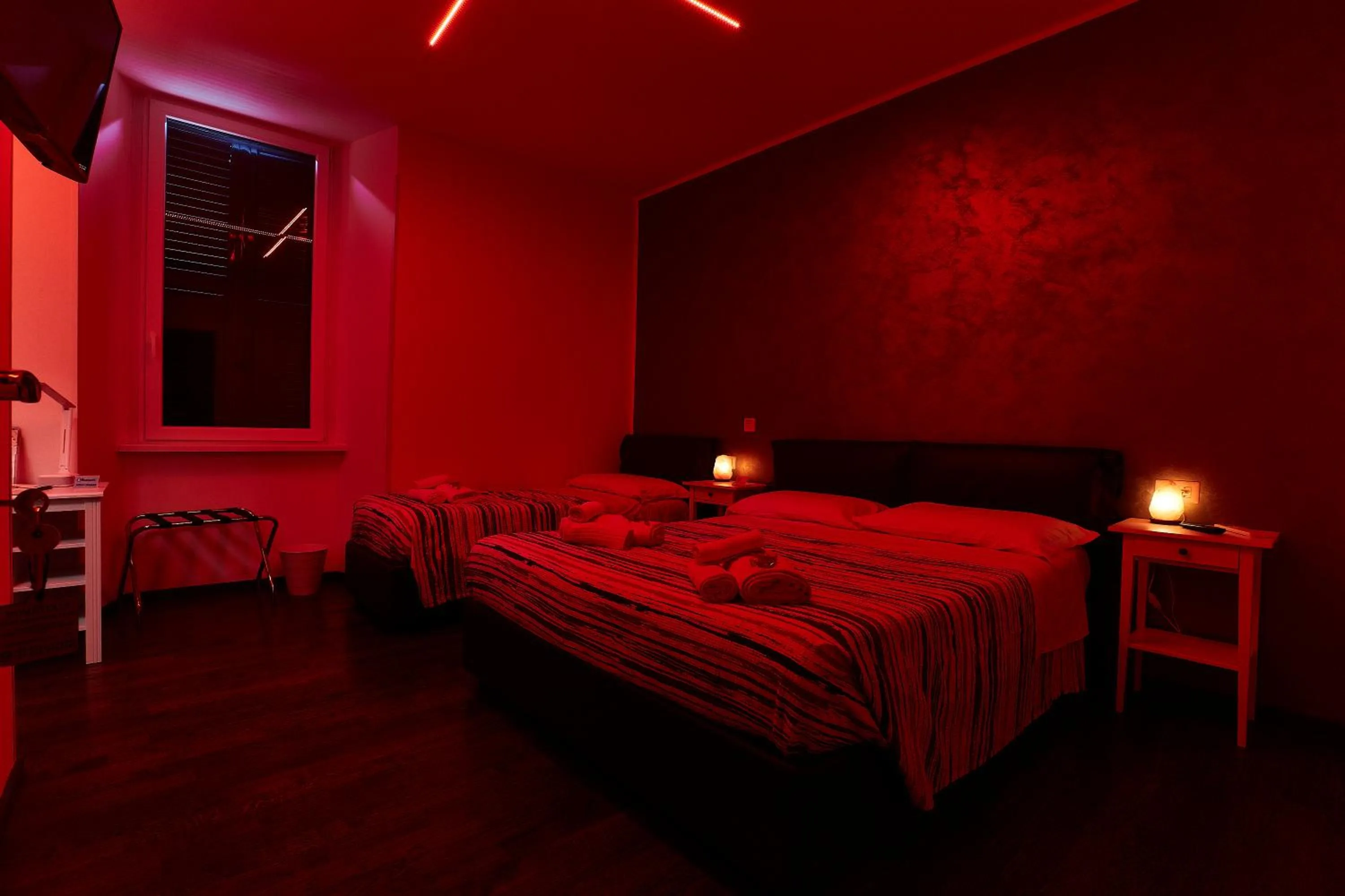 Bed in BB HomEitaly Civitavecchia