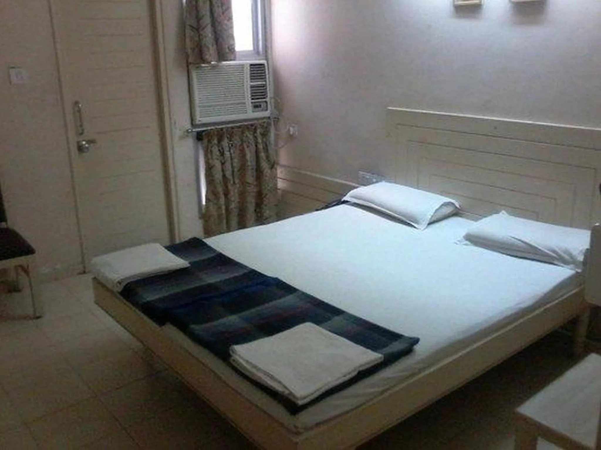 Bed in Hotel Rahi Inn