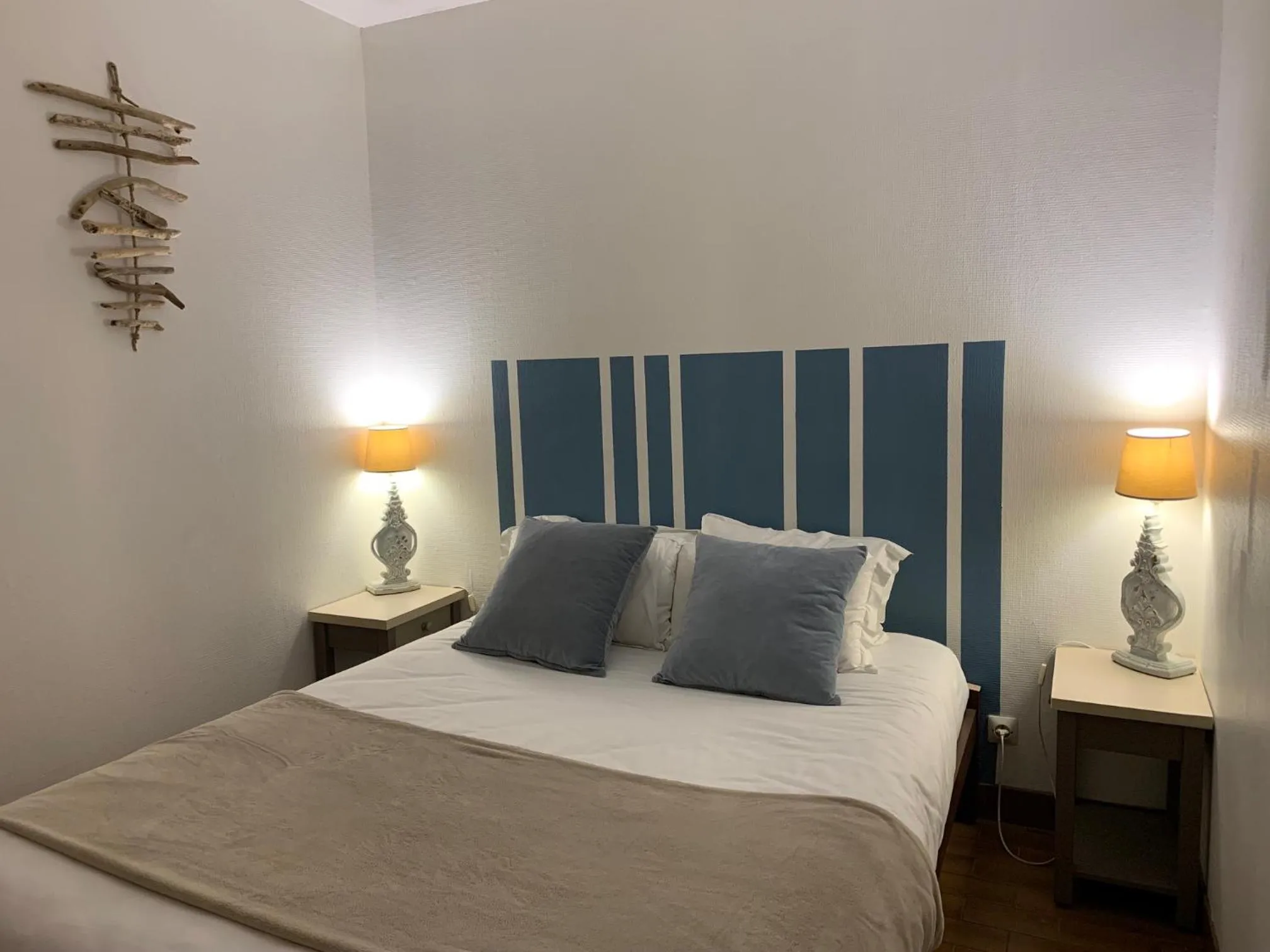 Photo of the whole room, Bed in LOGIS HOTELS - Hôtel et Restaurant L'Océana