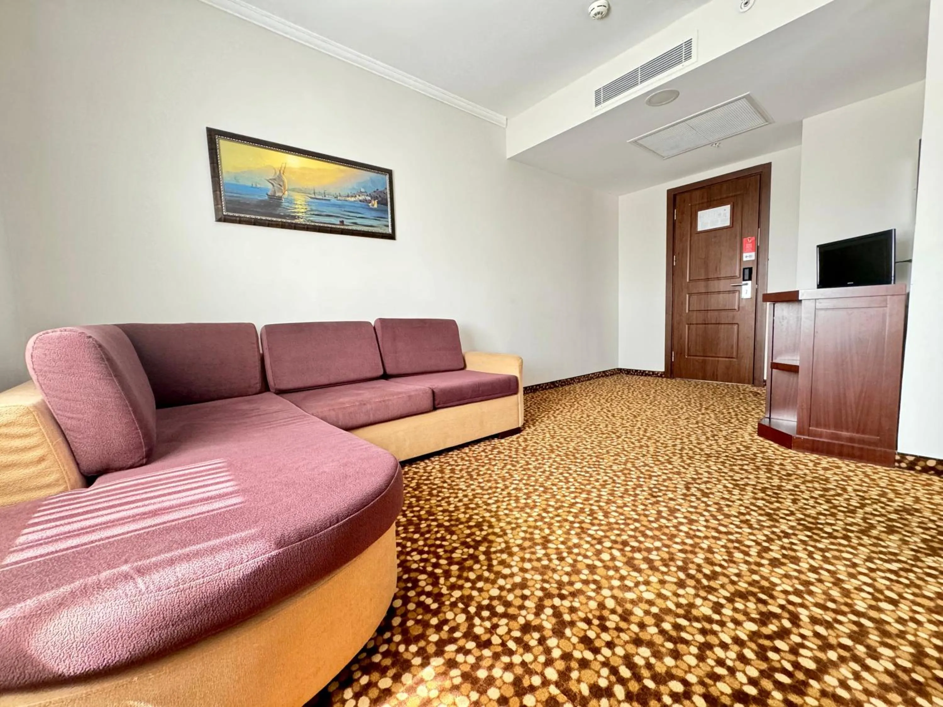 Living room in Best Western Plus Khan Hotel