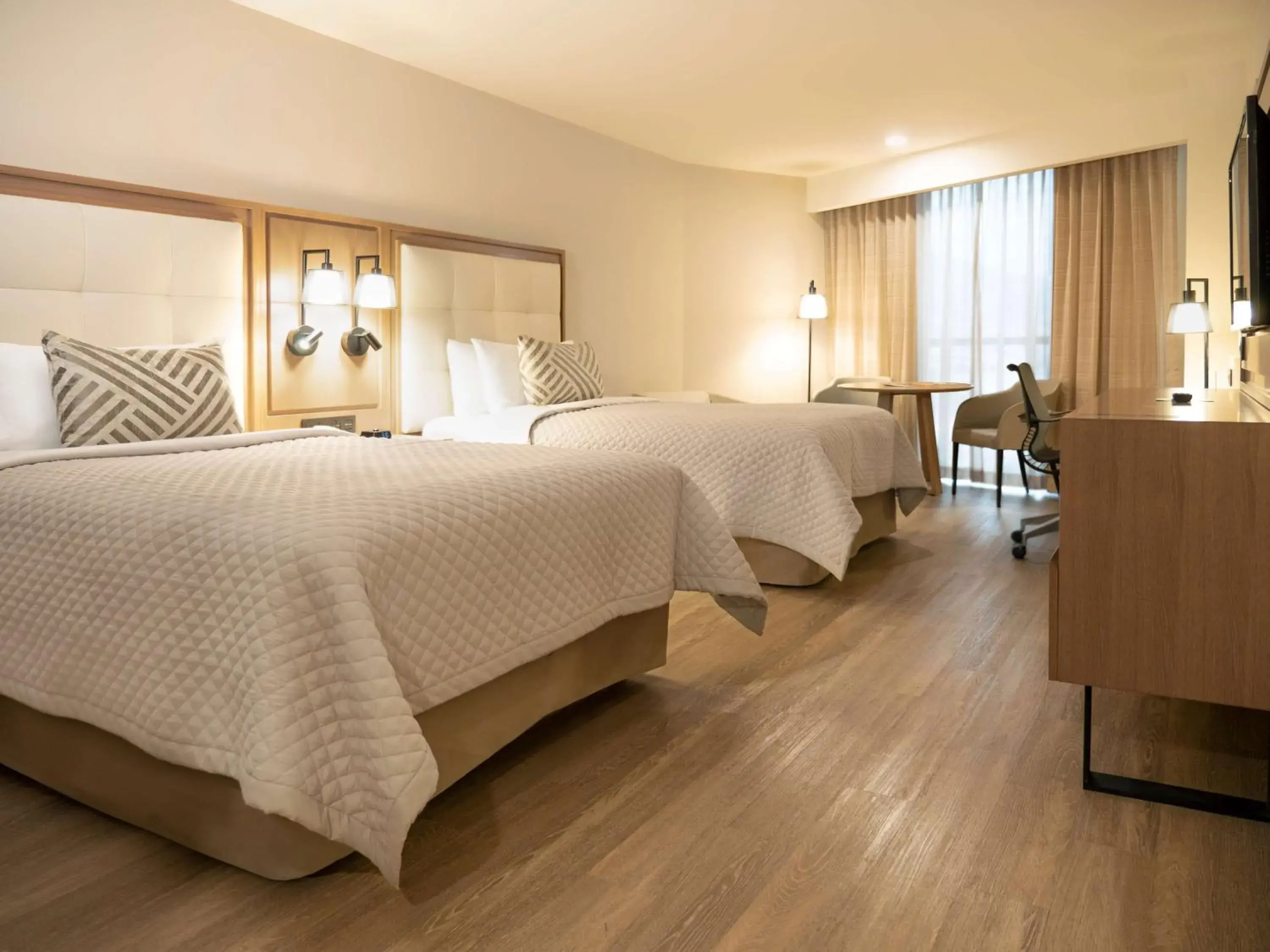 Junior Suite with Two Double Beds in MS Milenium Monterrey Curio Collection by Hilton Junior Suite with Two Double Beds in MS Milenium Monterrey Curio Collection by Hilton