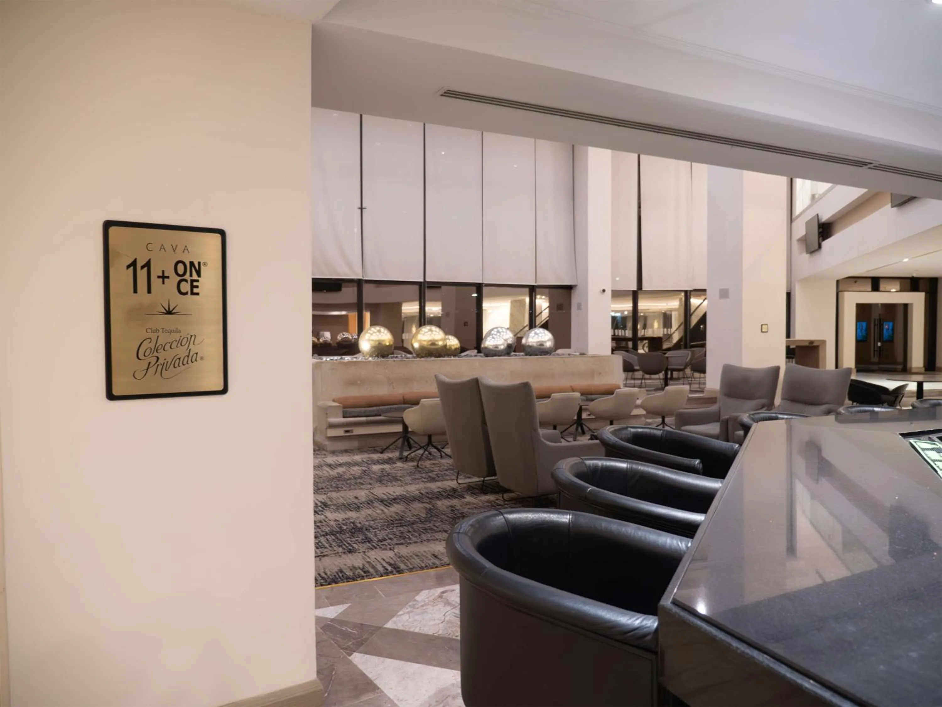 Lounge or bar in MS Milenium Monterrey Curio Collection by Hilton