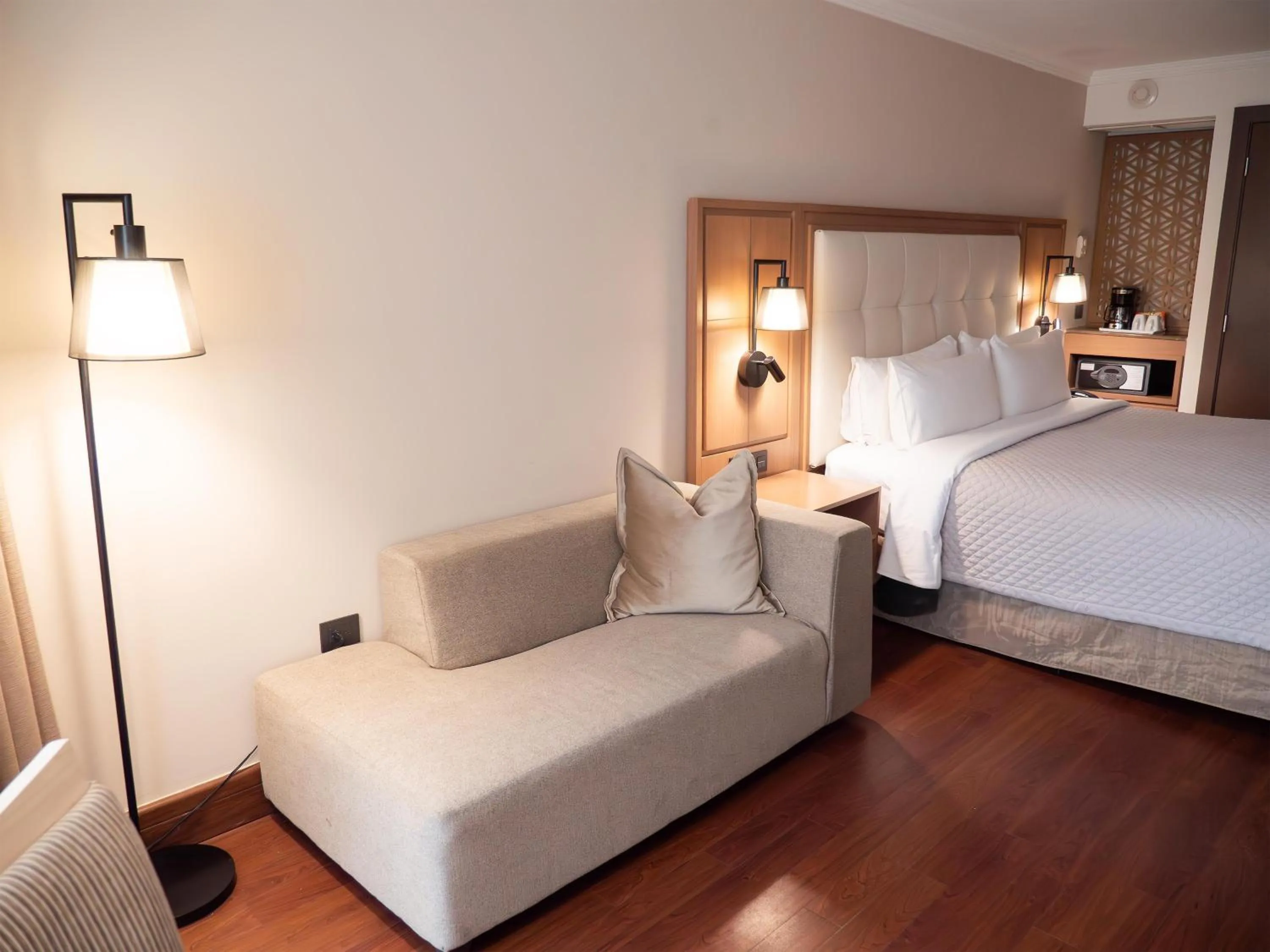 Living room, Bed in MS Milenium Monterrey Curio Collection by Hilton