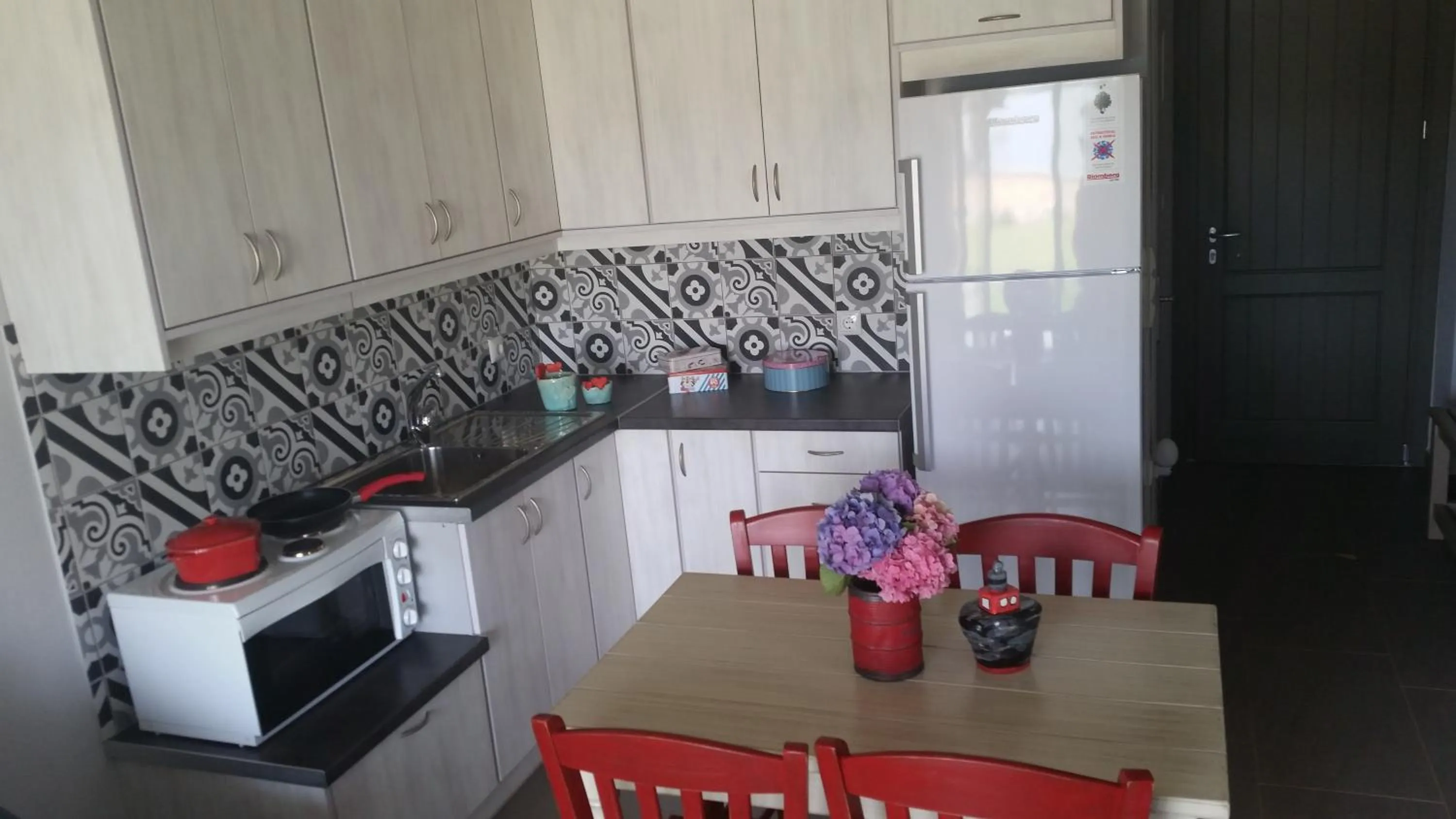 Kitchen or kitchenette in Thea Houses