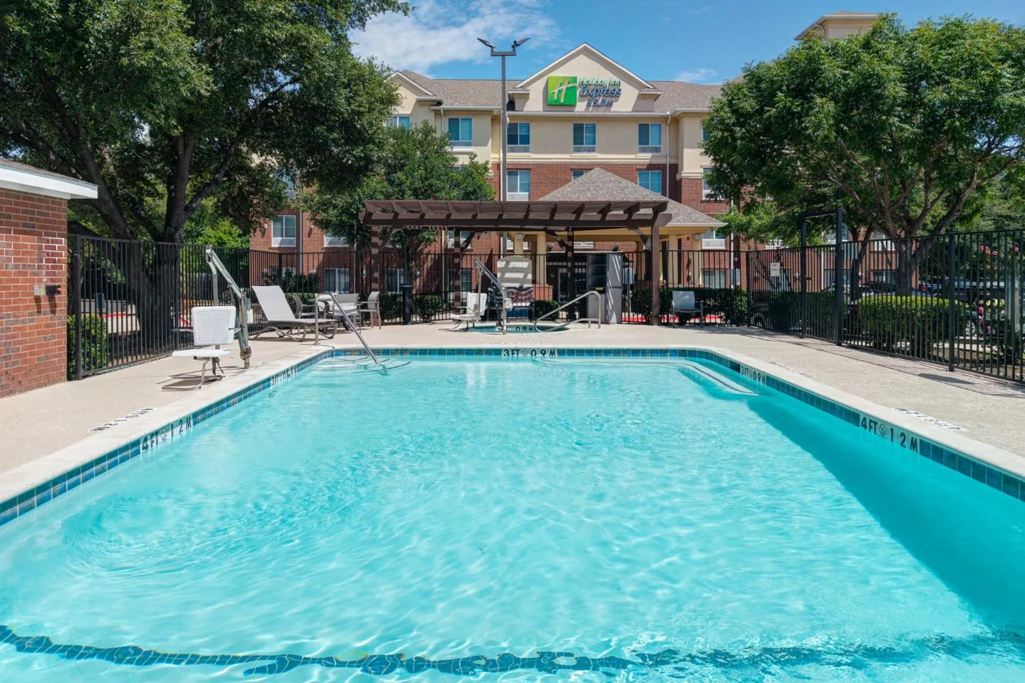 Swimming pool in Holiday Inn Express Hotel & Suites Dallas - Grand Prairie I-20 by IHG