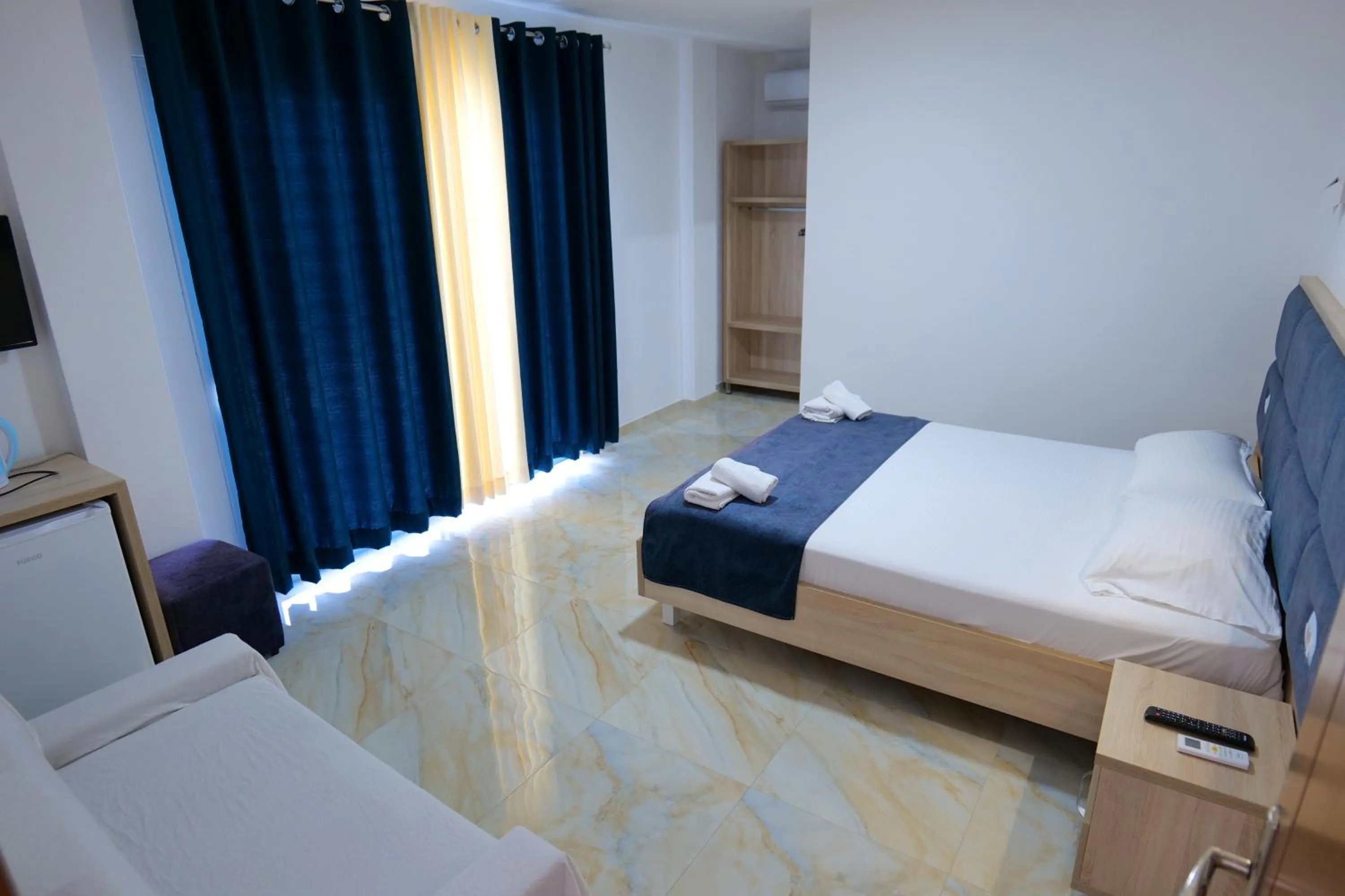 Photo of the whole room, Bed in Hotel Vathi