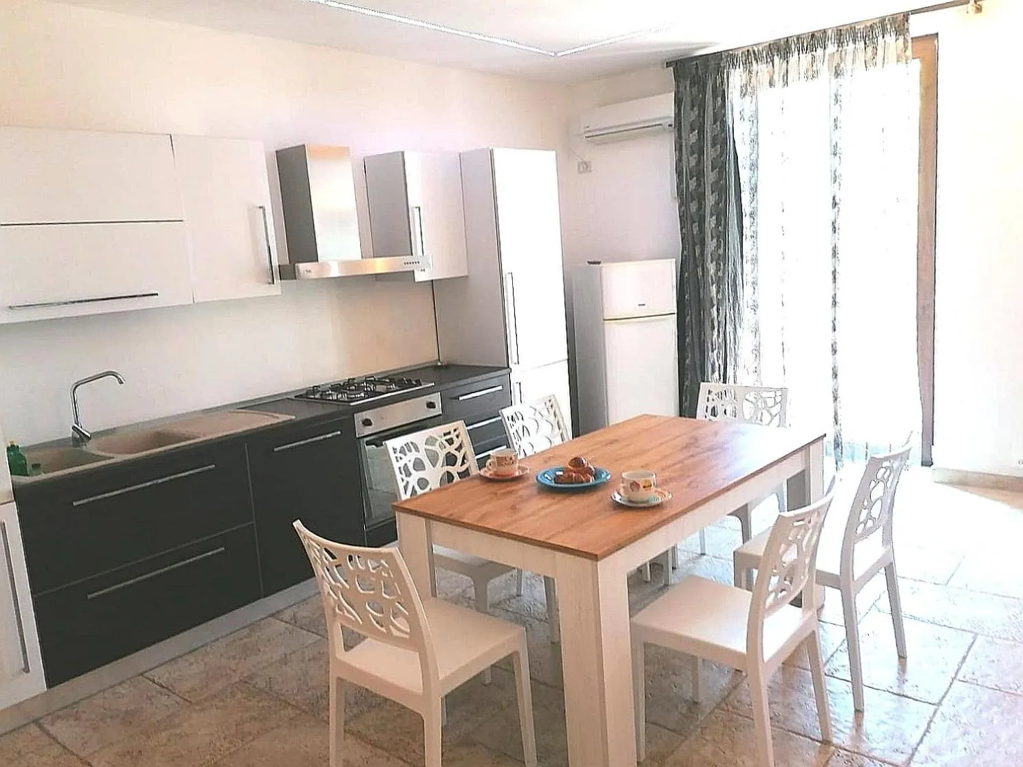 Kitchen or kitchenette in Casale Salento