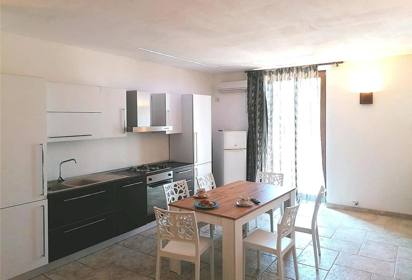 Kitchen or kitchenette in Casale Salento