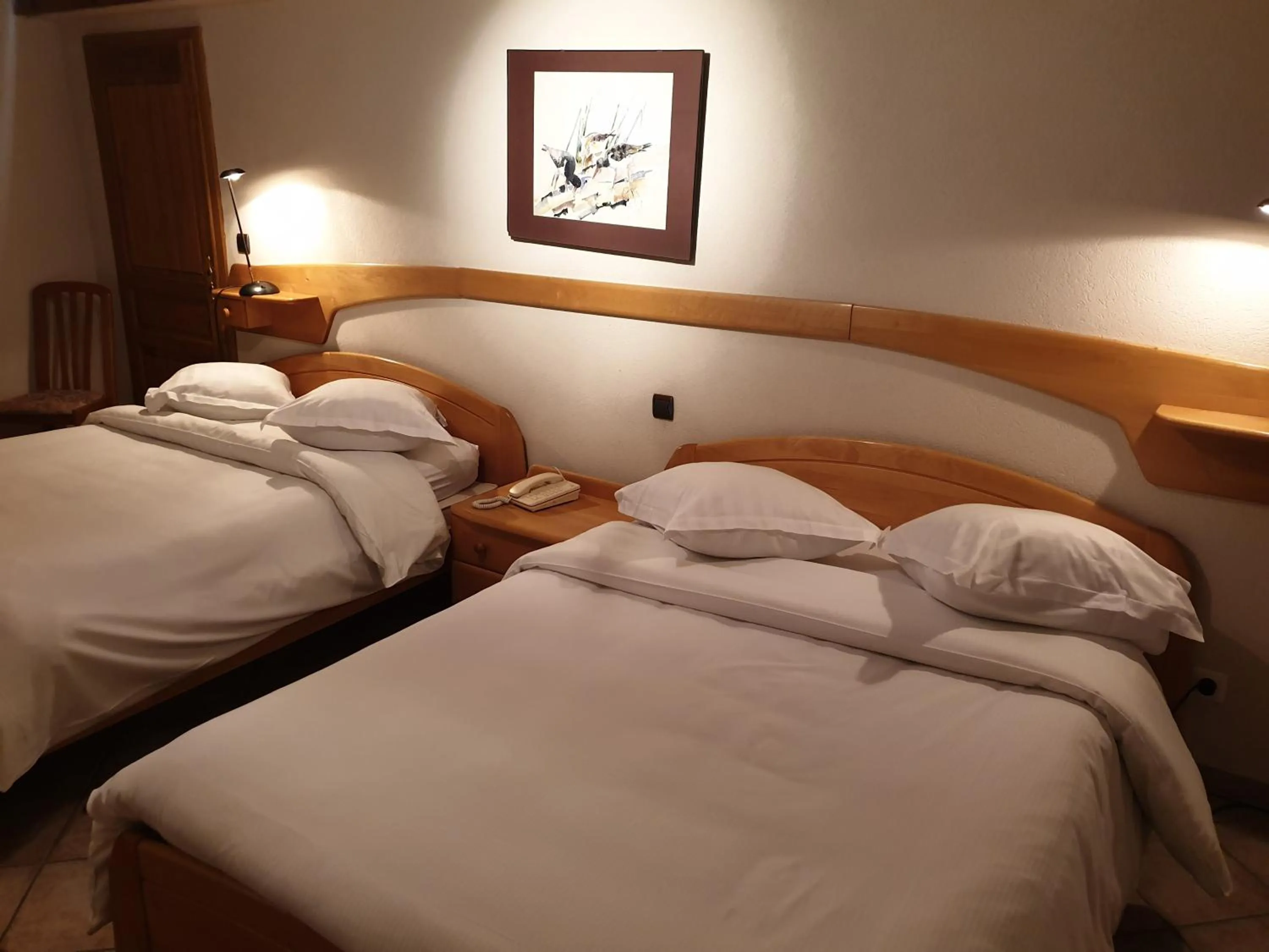 Photo of the whole room, Bed in Logis Hotel Restaurant Le Faudé