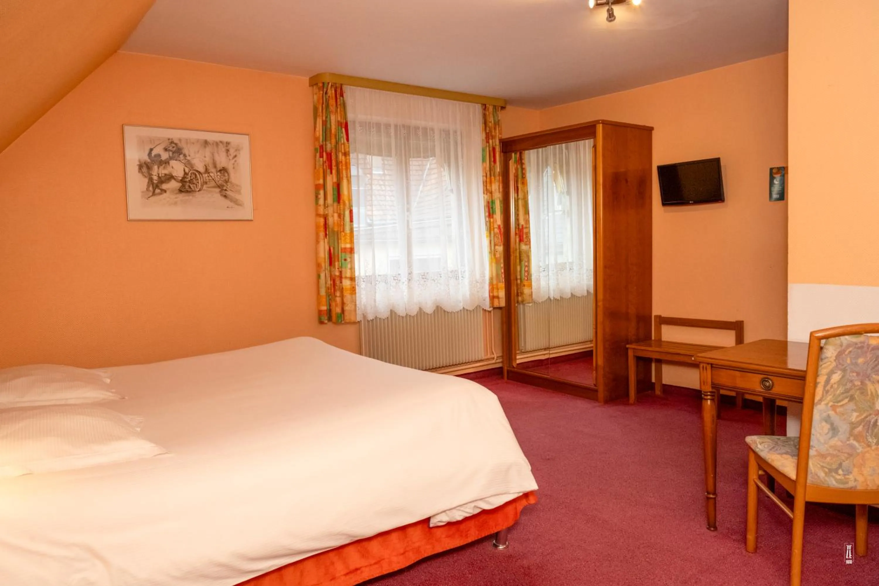 Photo of the whole room, Bed in Logis Hotel Restaurant Le Faudé