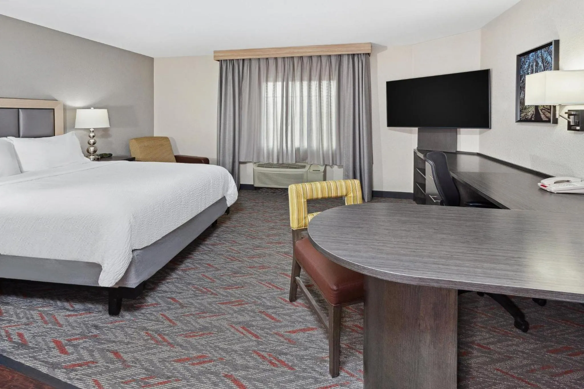 Photo of the whole room, Bed in Candlewood Suites Appleton by IHG