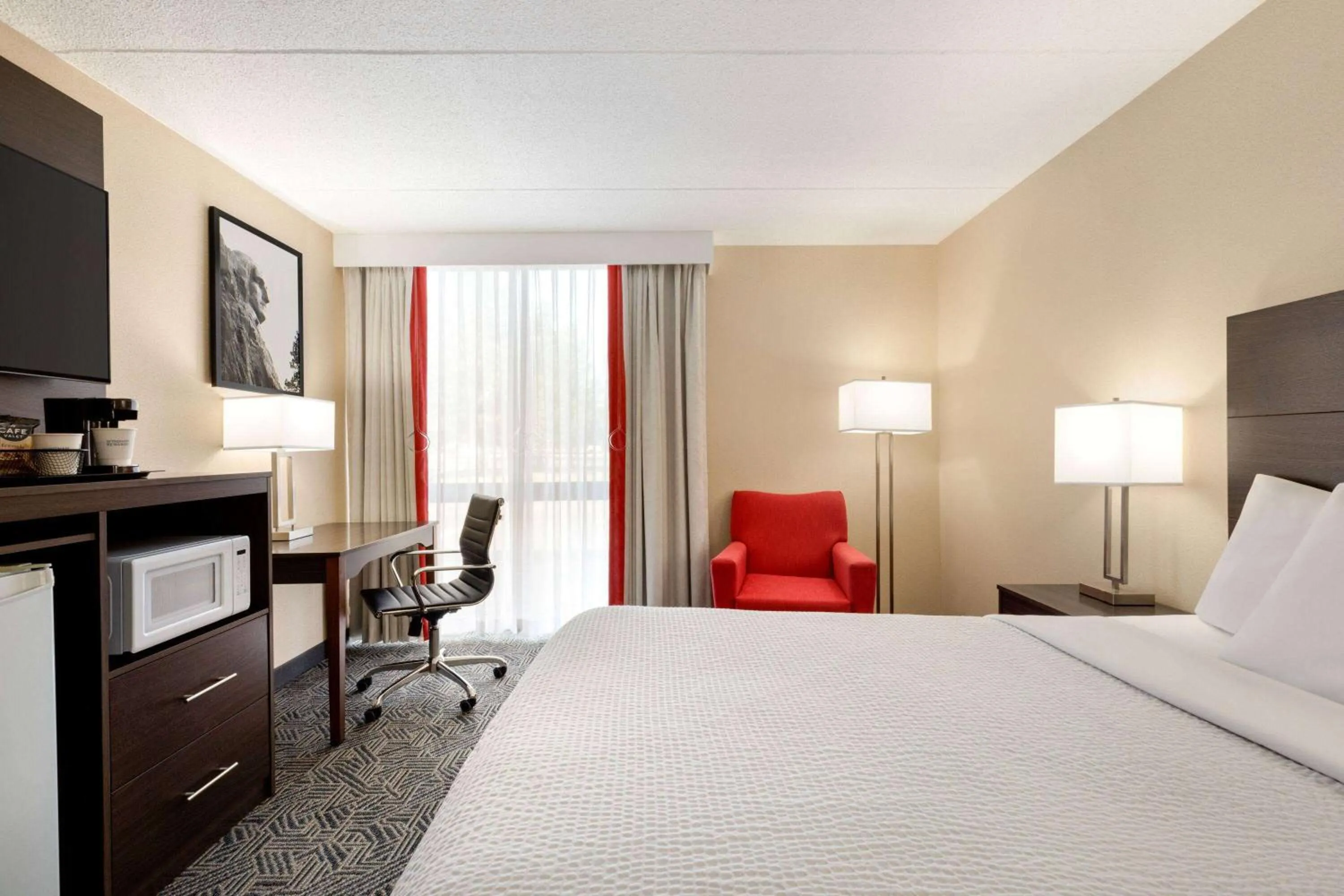 Photo of the whole room, Bed in Ramada by Wyndham Alpena