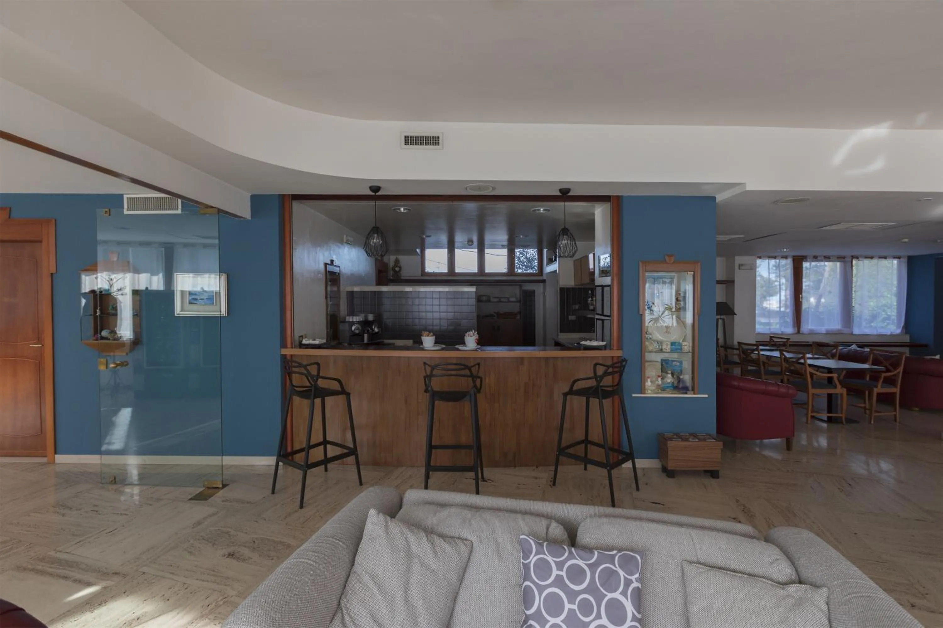 Communal lounge/ TV room in Hotel La Baia