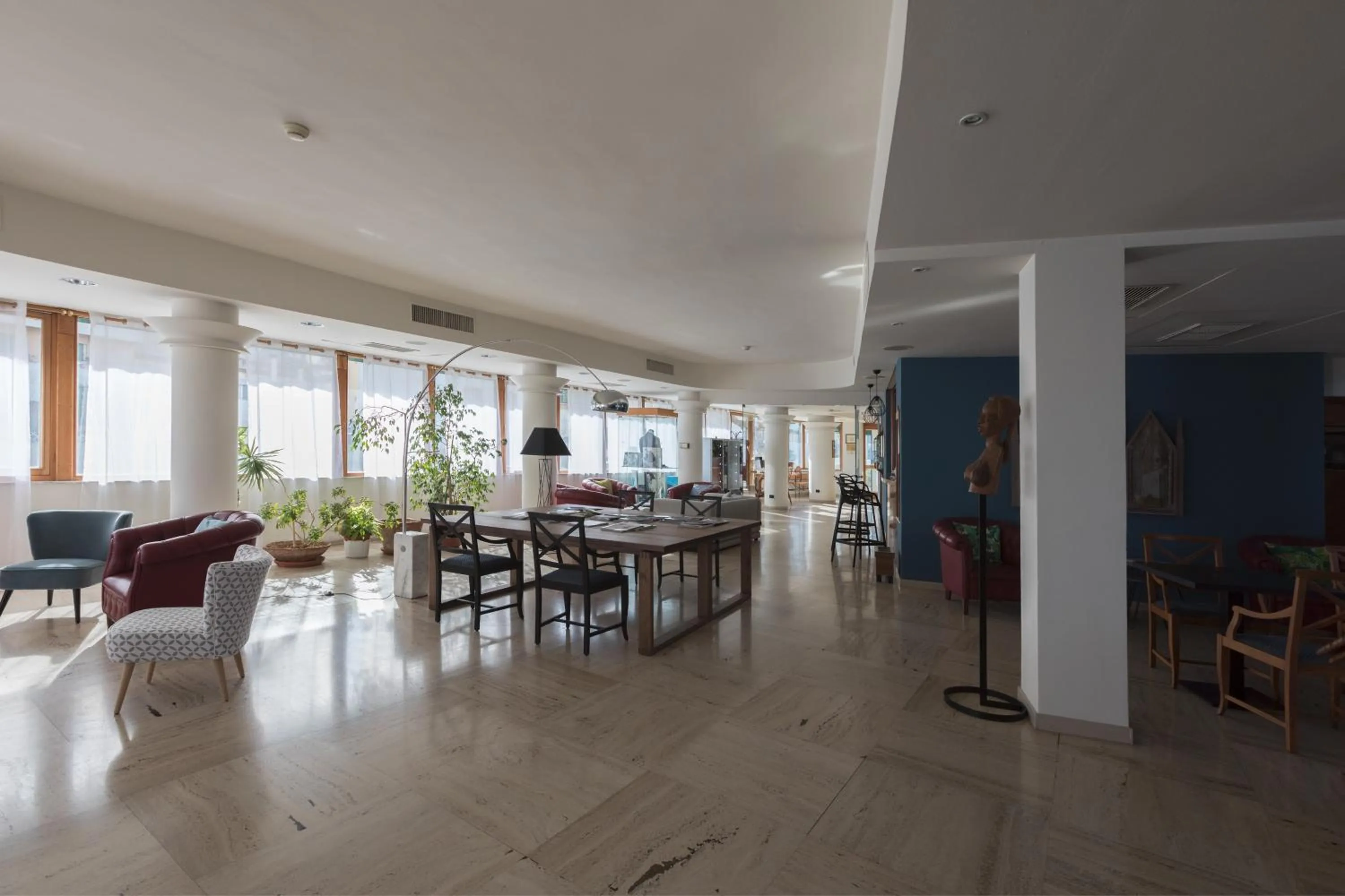 Communal lounge/ TV room in Hotel La Baia