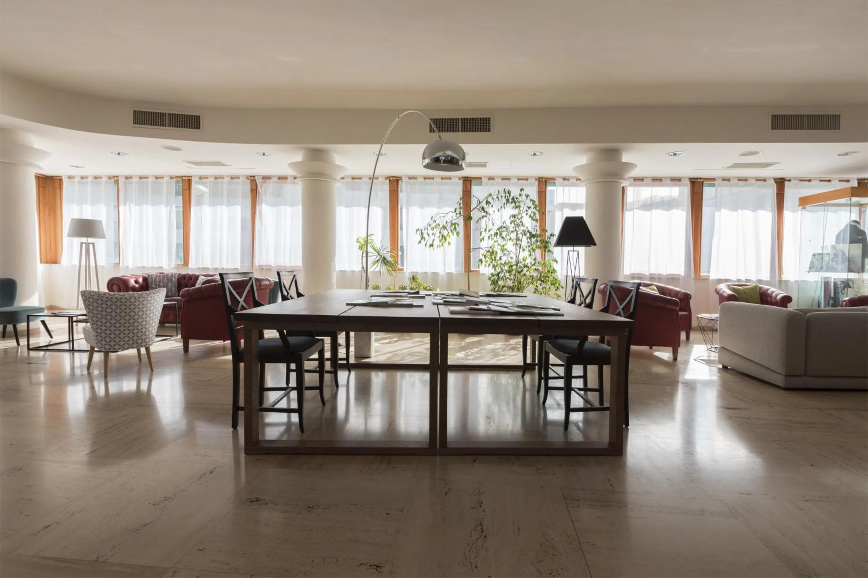 Communal lounge/ TV room in Hotel La Baia