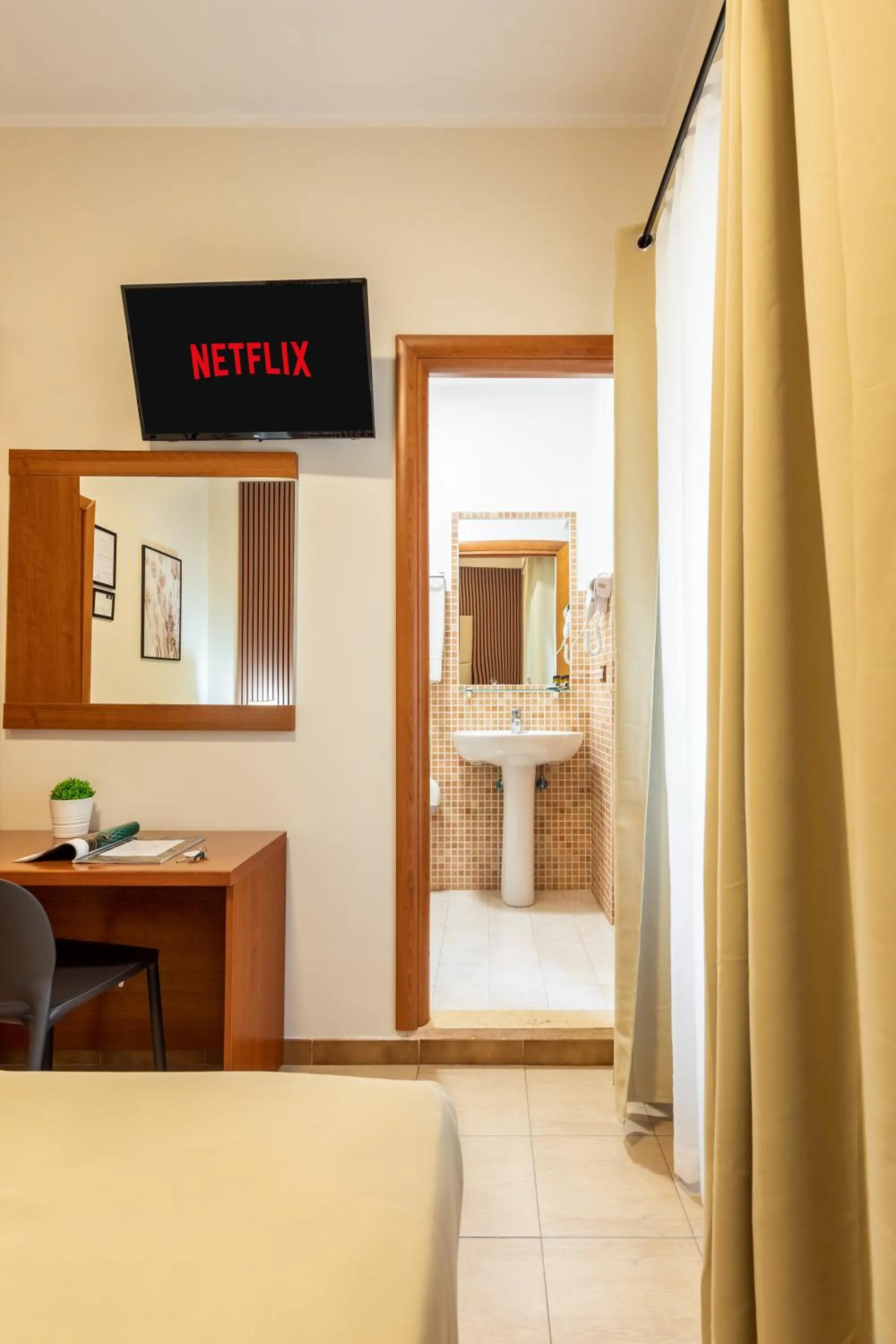 Bedroom in AlbaDomus Affittacamere o GuestHouse